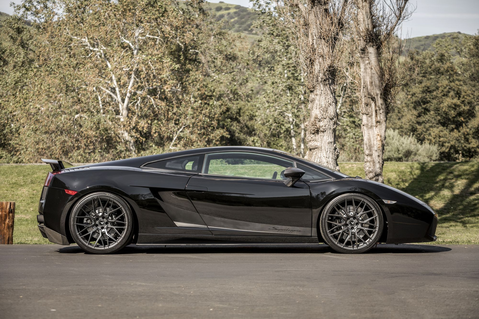Carbon Fiber Side Skirts on Black Lamborghini Gallardo - Photo by Vorstiner