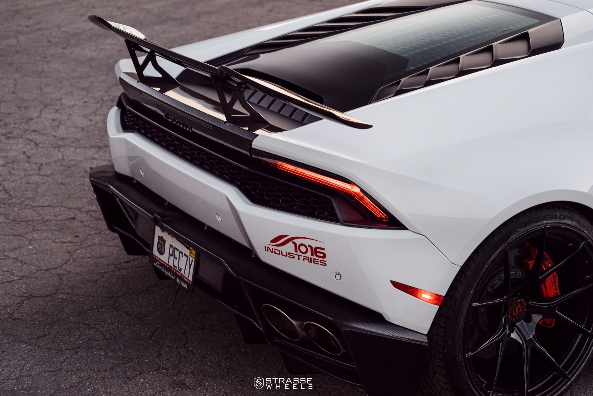 White Lamborghini Huracan with Large Wing Spoiler - Photo by Strasse Forged