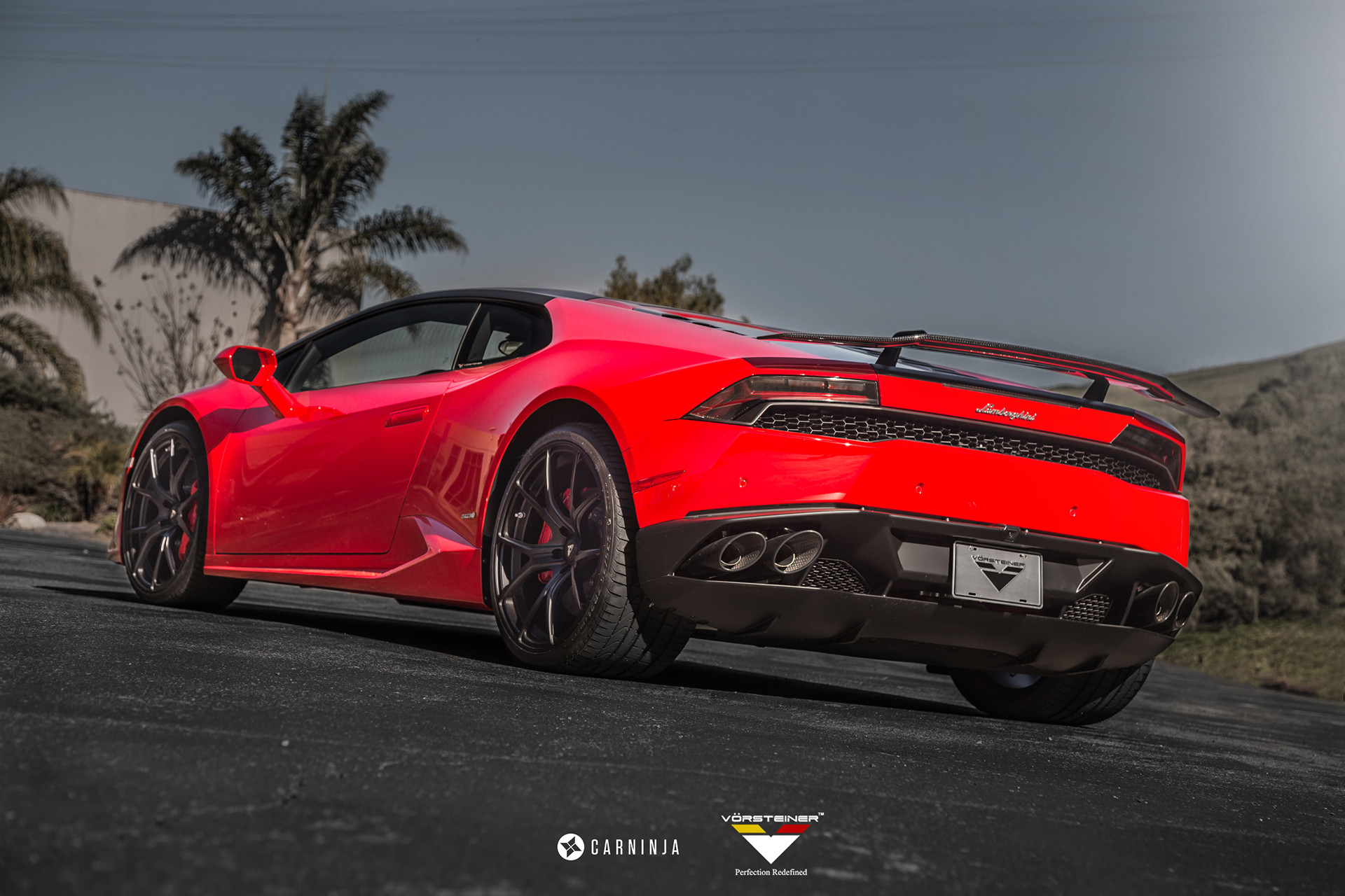 Carbon Fiber Rear Diffuser on Red Lamborghini Huracan - Photo by Vorstiner