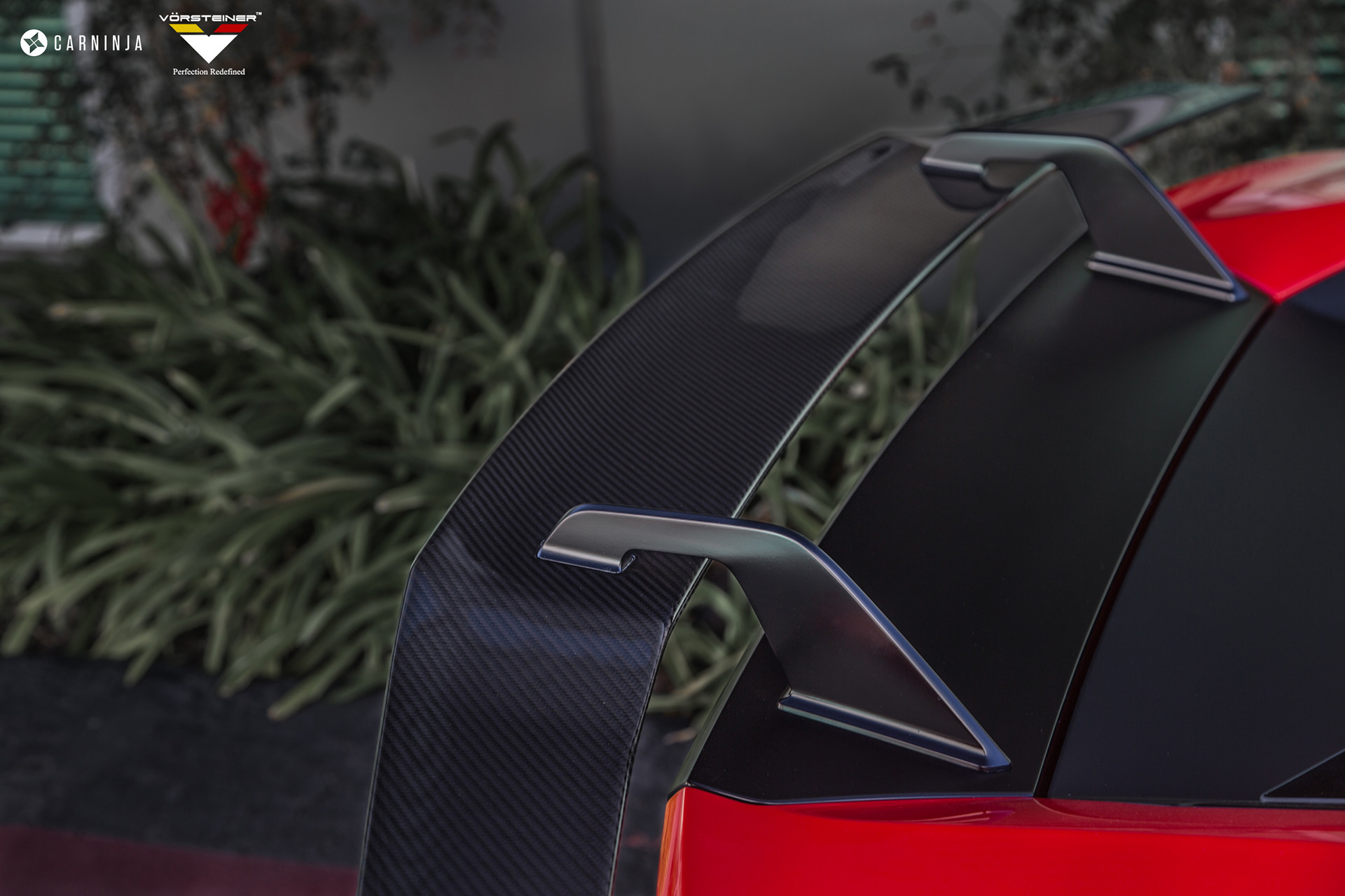Red Lamborghini Huracan with Custom Carbon Fiber Spoiler - Photo by Vorstiner