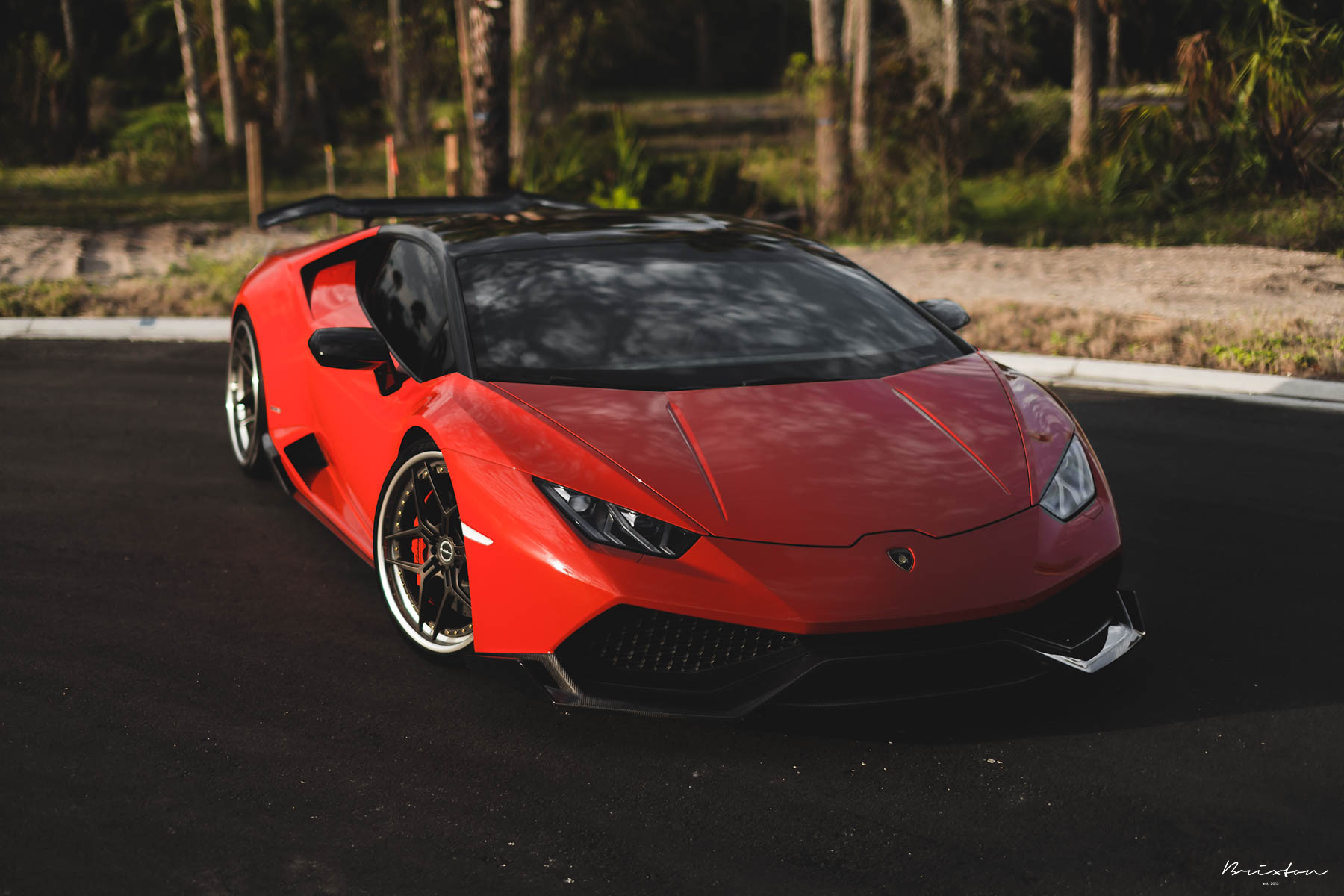 Aftermarket Side Scoops on Red Lamborghini Huracan - Photo by Brixton Forged Wheels
