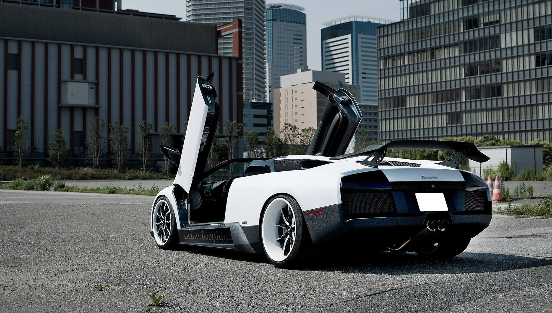 Black and White Lamborghini Murcielago with Aftermarket Body Kit - Photo by Lexani