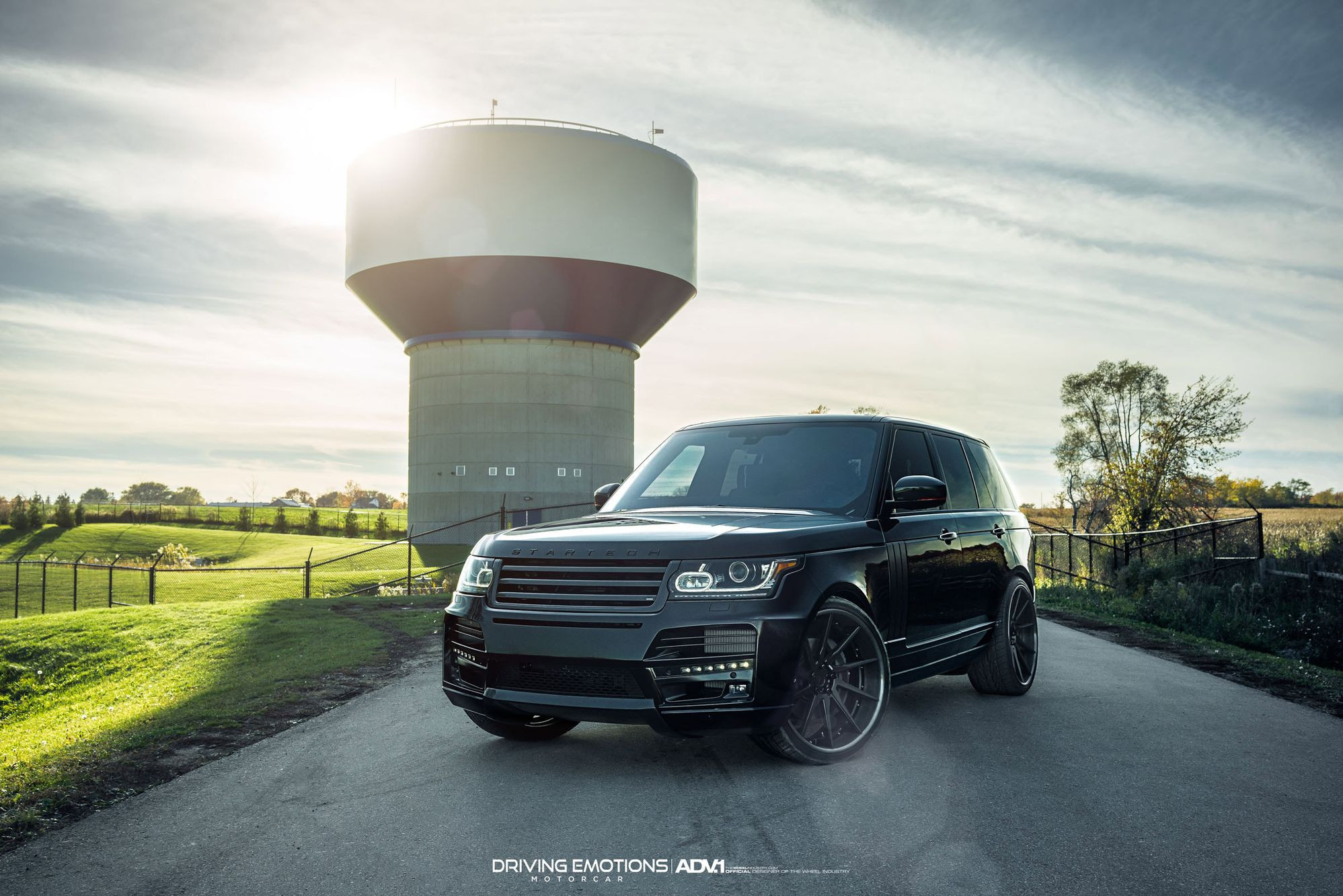 Black Range Rover with Aftermarket Headlights - Photo by ADV.1