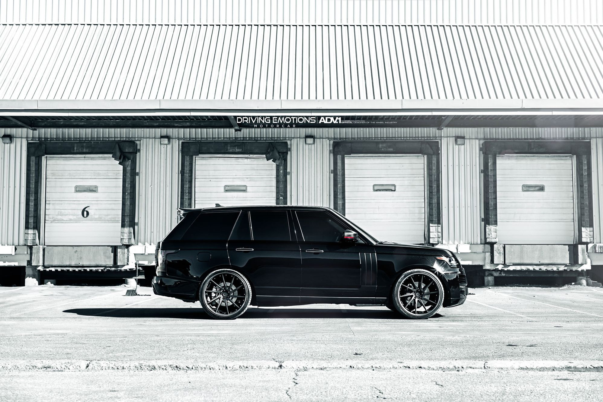 Custom Side Skirts on Black Range Rover - Photo by ADV.1