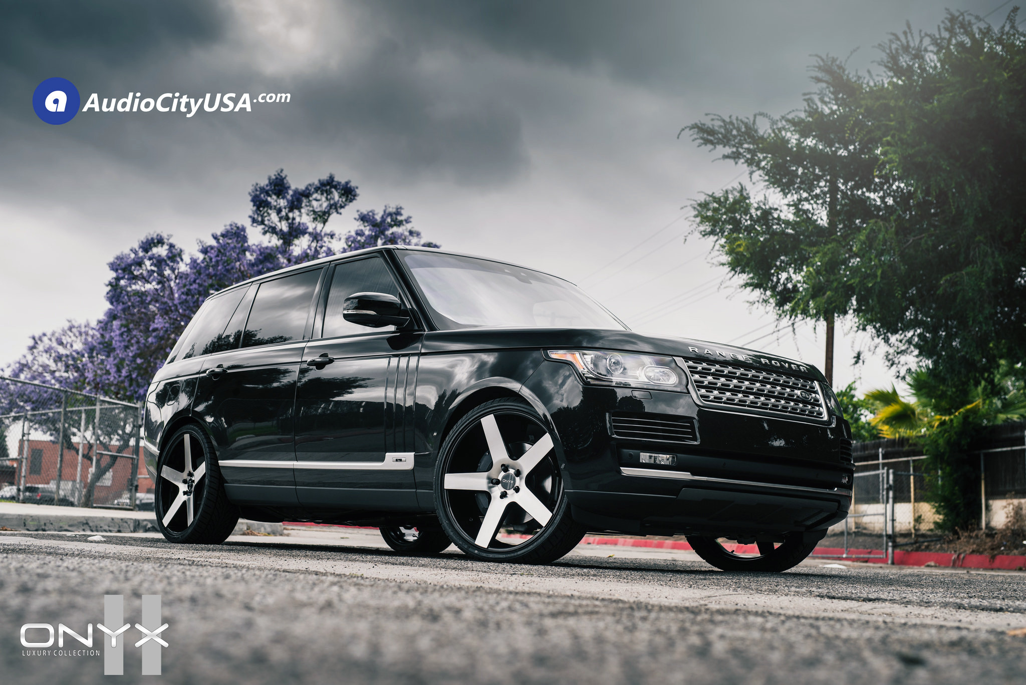 Black Range Rover with Aftermarket Headlights - Photo by Rennen International