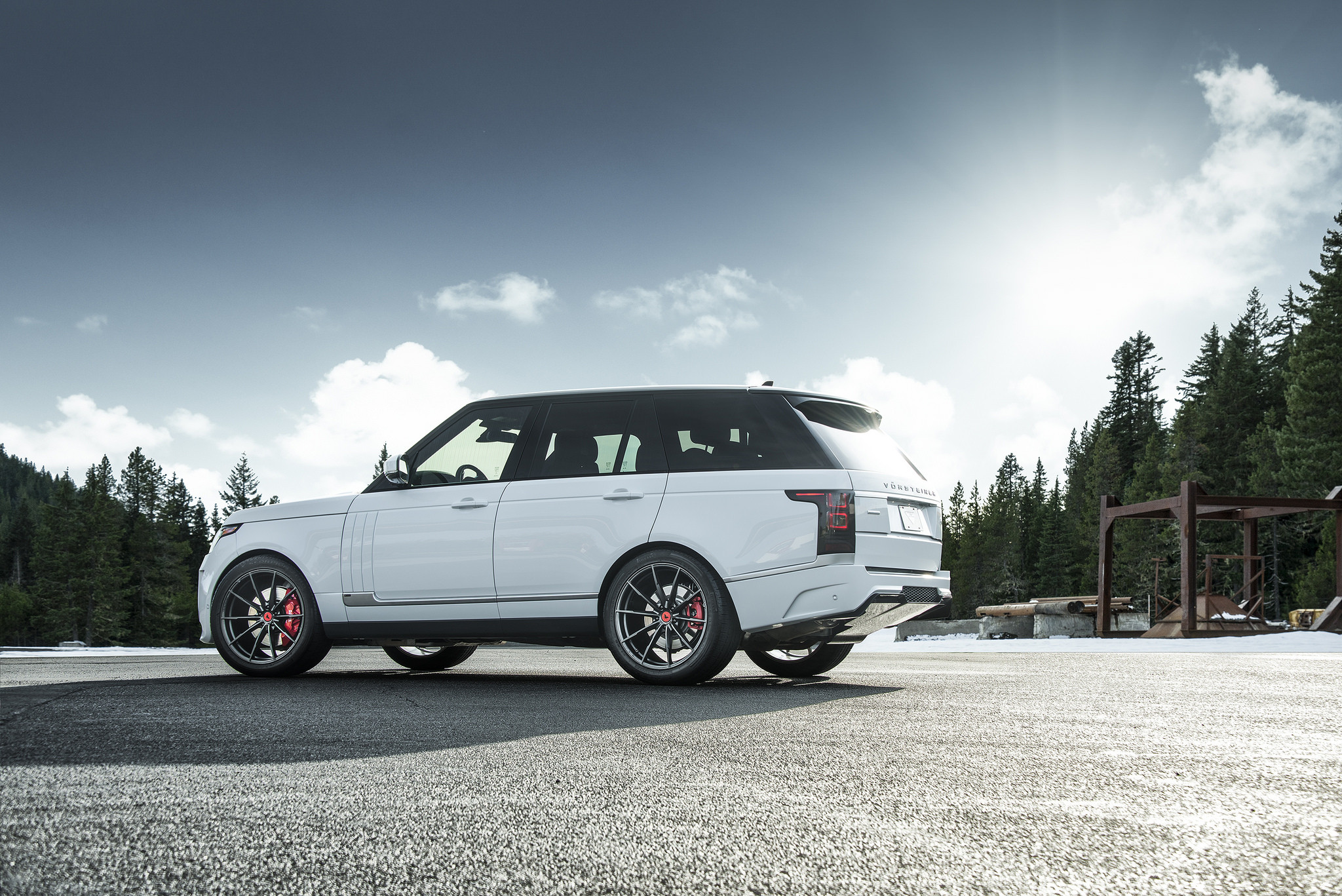 Custom White Range Rover Side Skirts - Photo by Vorsteiner