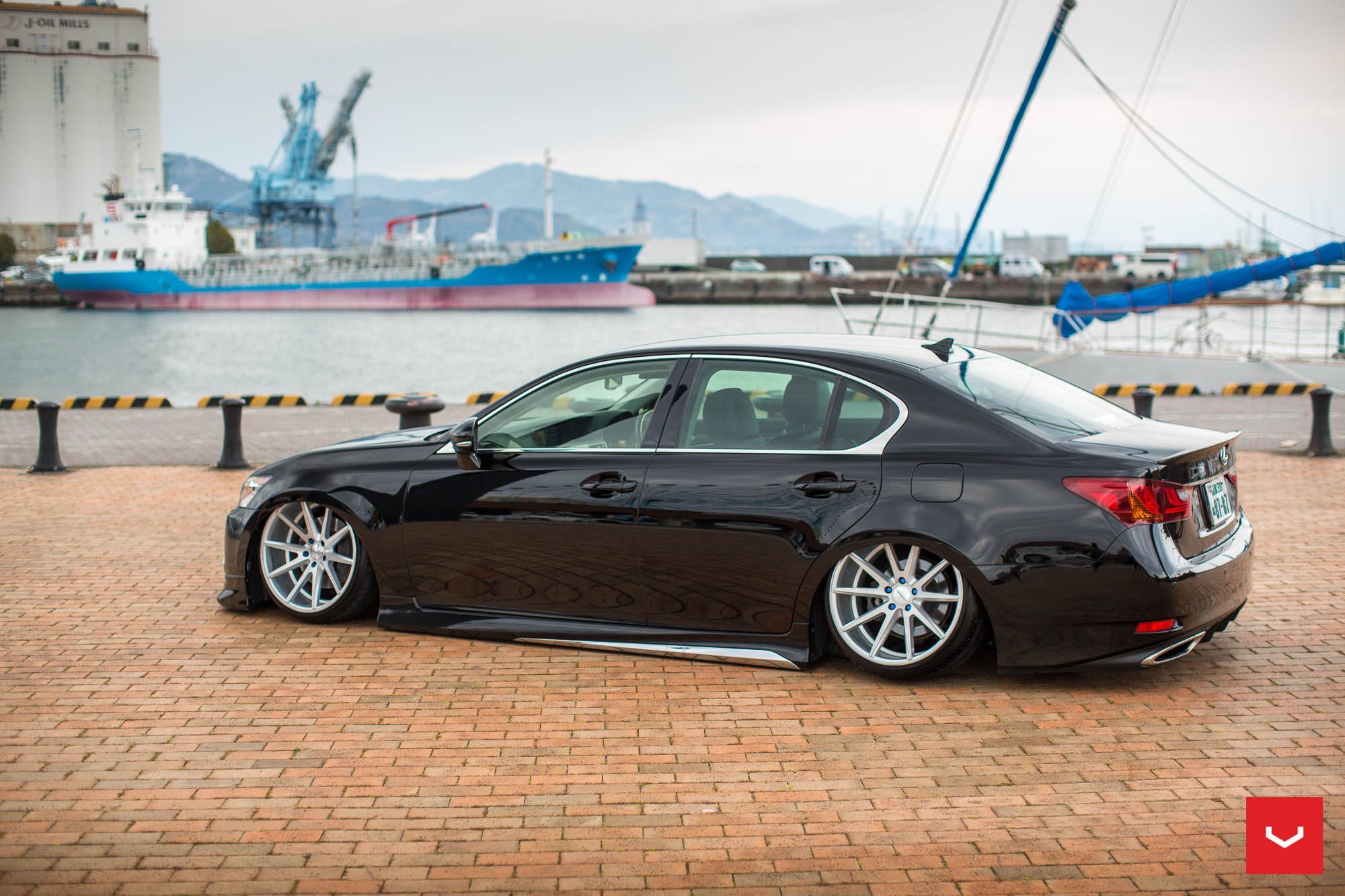 Vip Style Slammed Lexus GS put on Large Custom Wheels by Vossen.