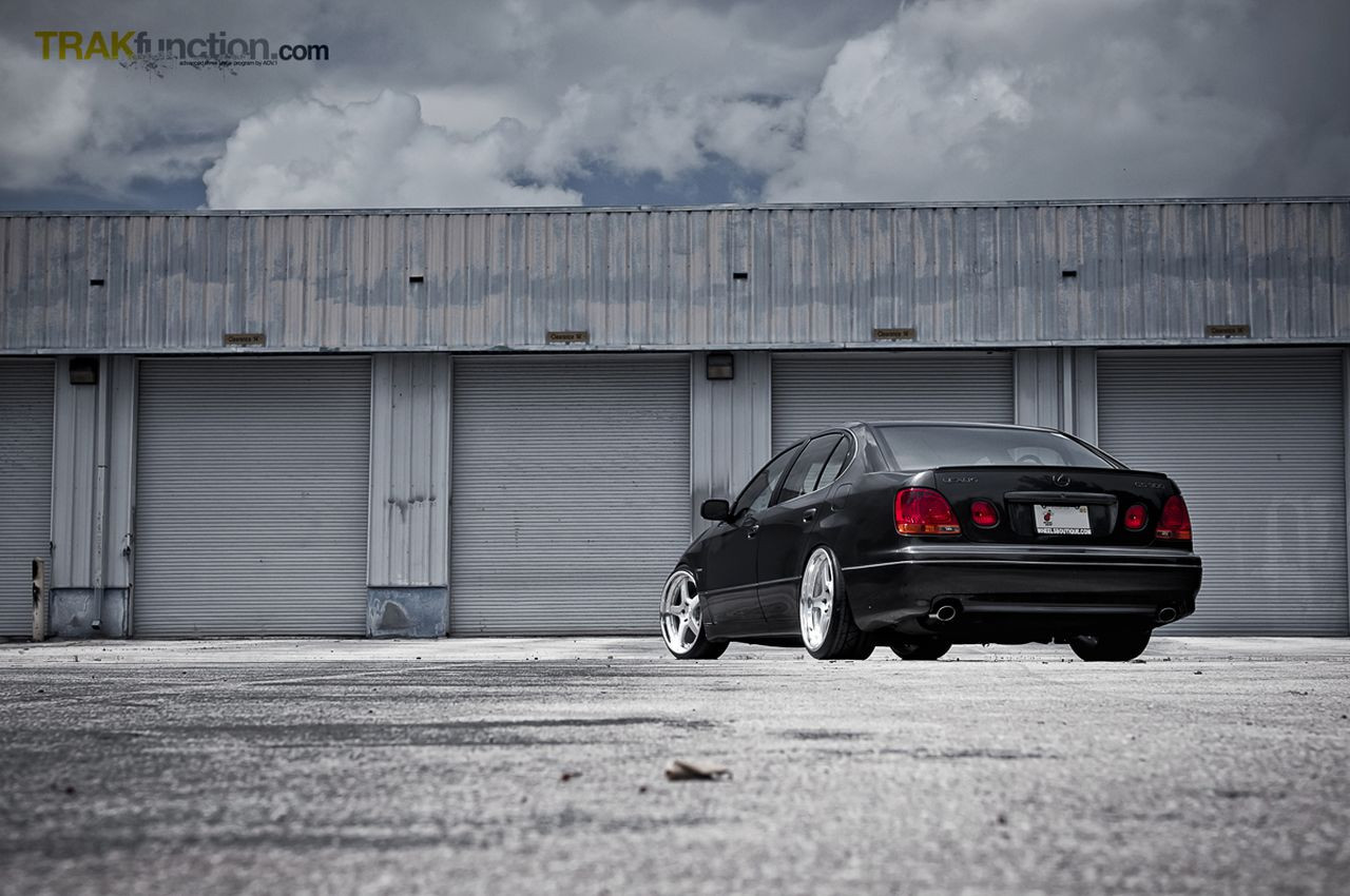 Aftermarket Red Taillights on Black Lexus GS - Photo by ADV.1
