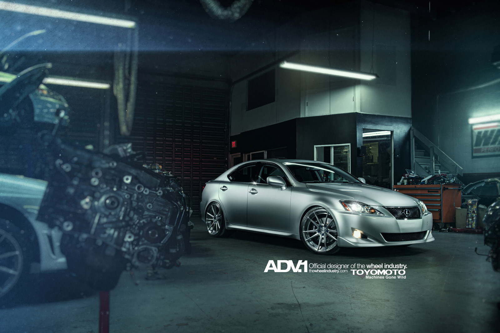 Aftermarket Projector Headlights on Gray Lexus IS - Photo by ADV.1
