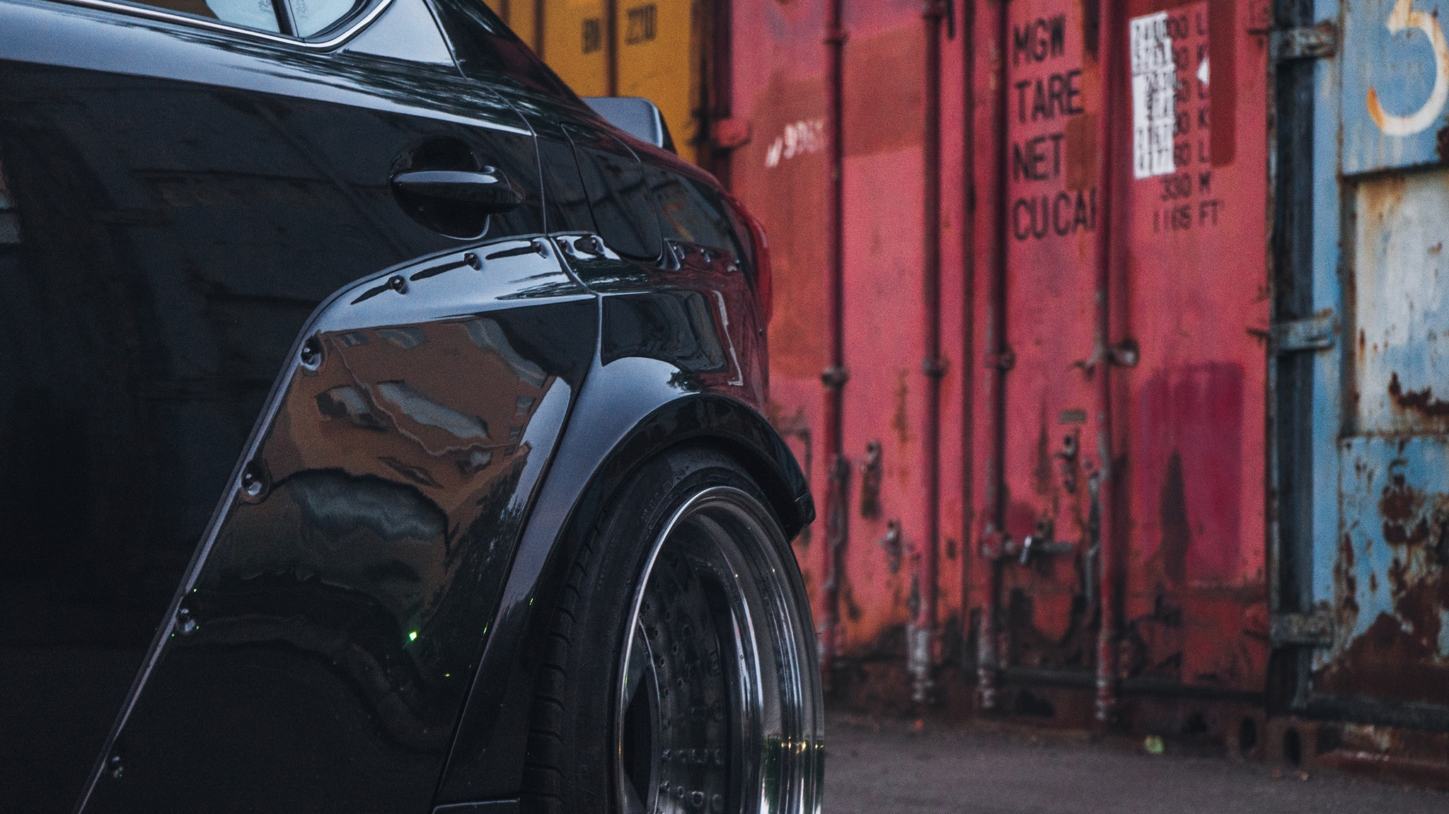 Black Stanced Lexus IS with Custom Fender Flares - Photo by Clinched