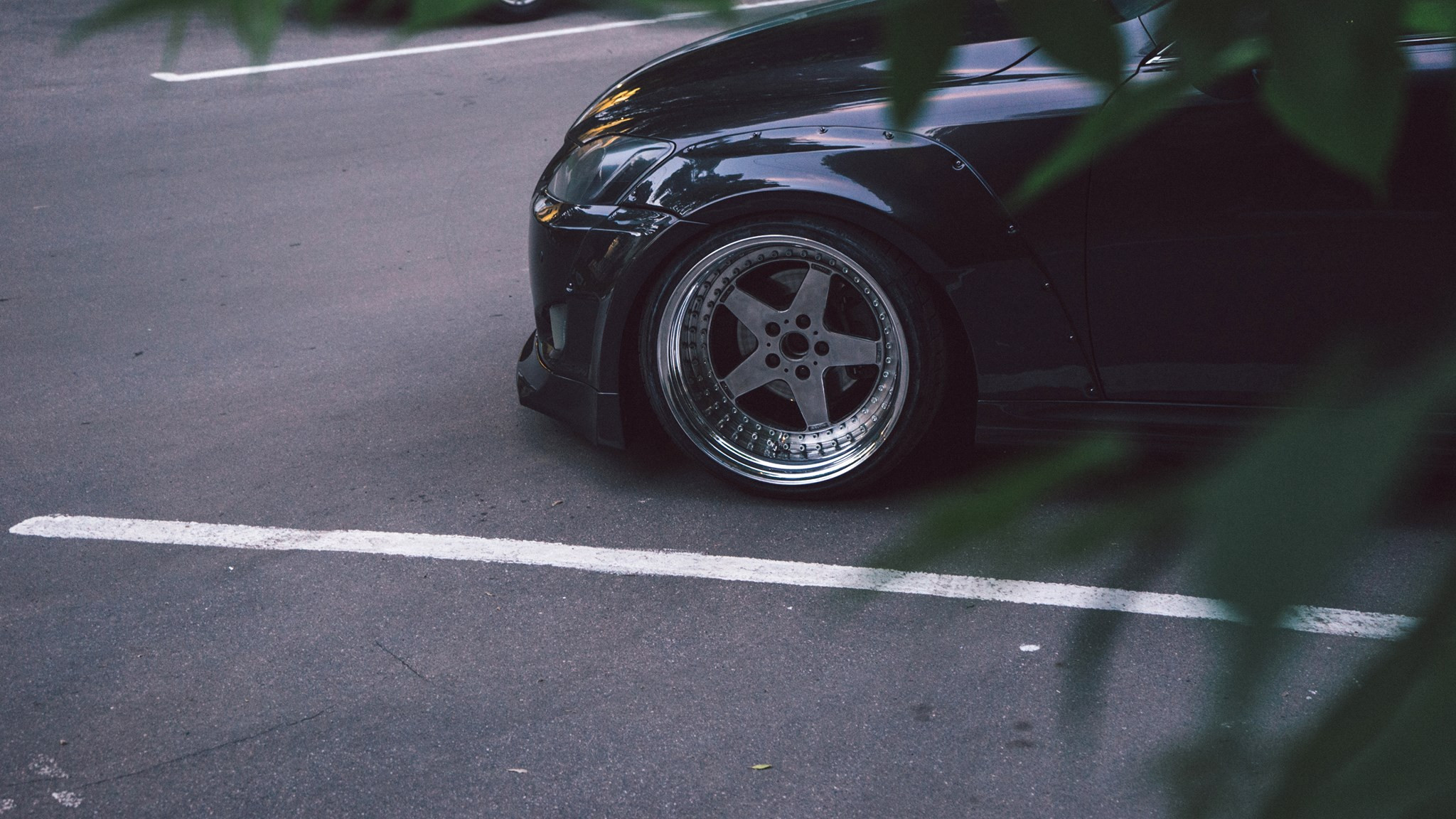 Black Stanced Lexus IS with Chrome Rims - Photo by Clinched