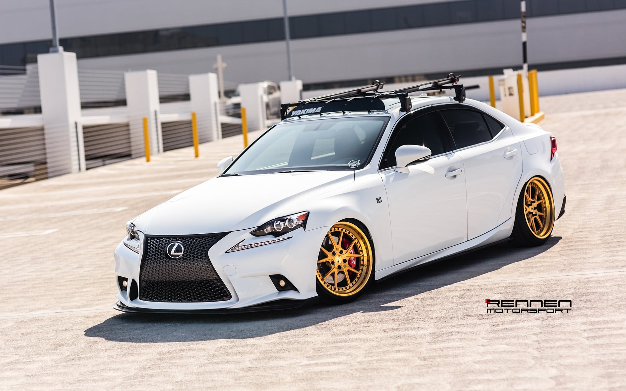 White Lexus IS with Yakima Rack System - Photo by Rennen International