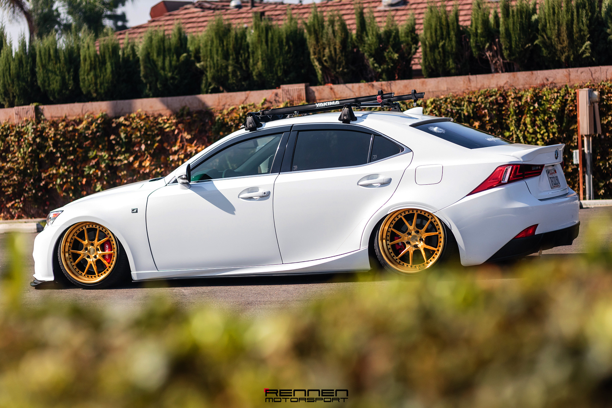 Aftermarket Side Skirts on White Lowered Lexus IS - Photo by Rennen International