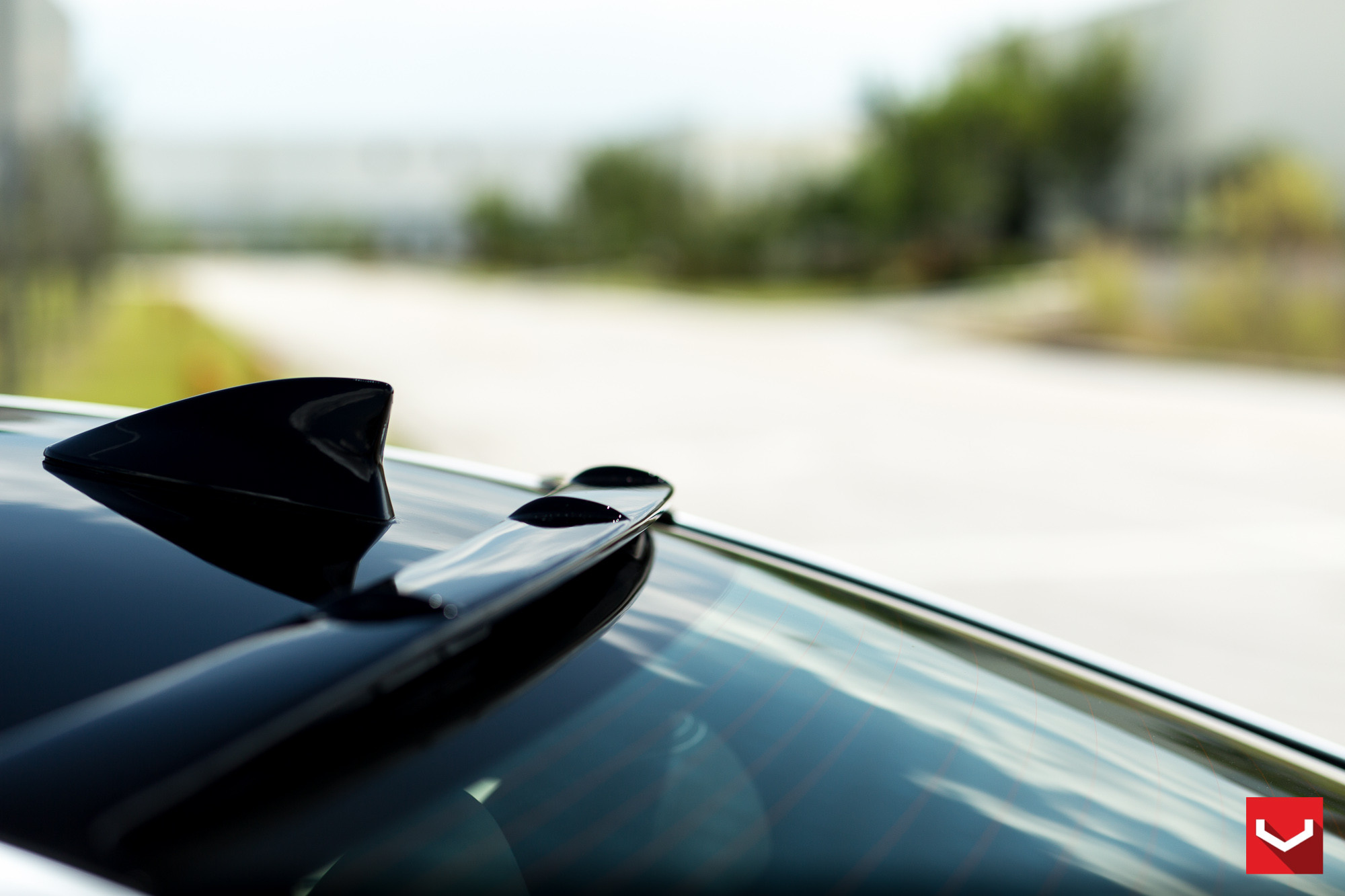 Roofline Spoiler on White Lexus LS - Photo by Vossen