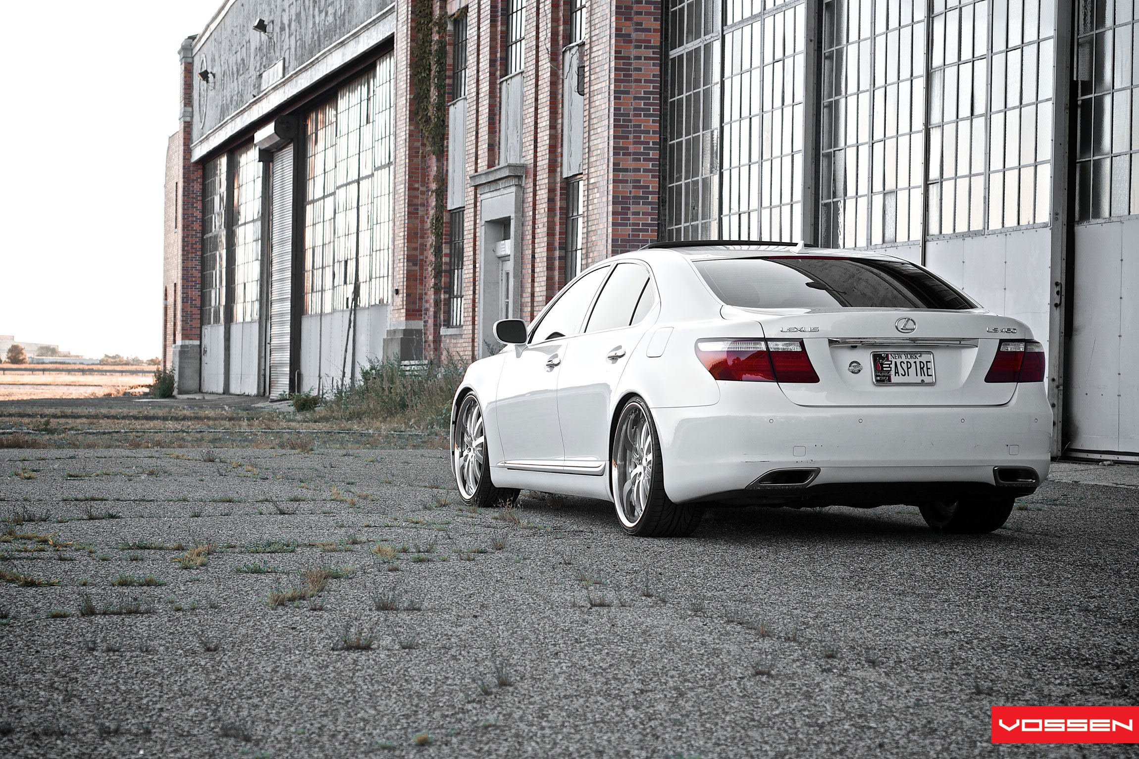White Lexus LS with Aftermarket Rear Bumper Cover - Photo by Vossen.