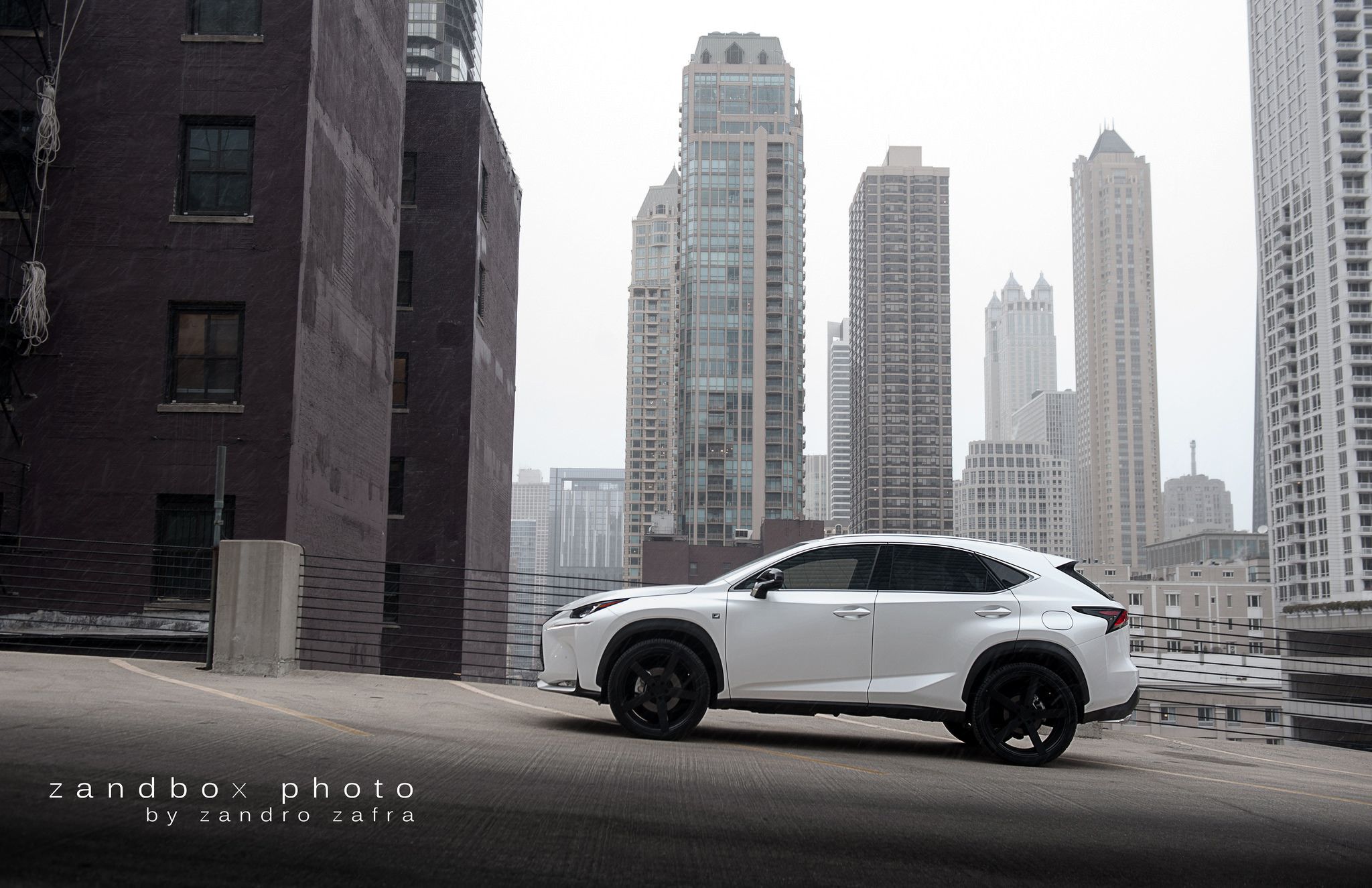 Matte Black Custom Rims on White Lexus NX - Photo by zandbox