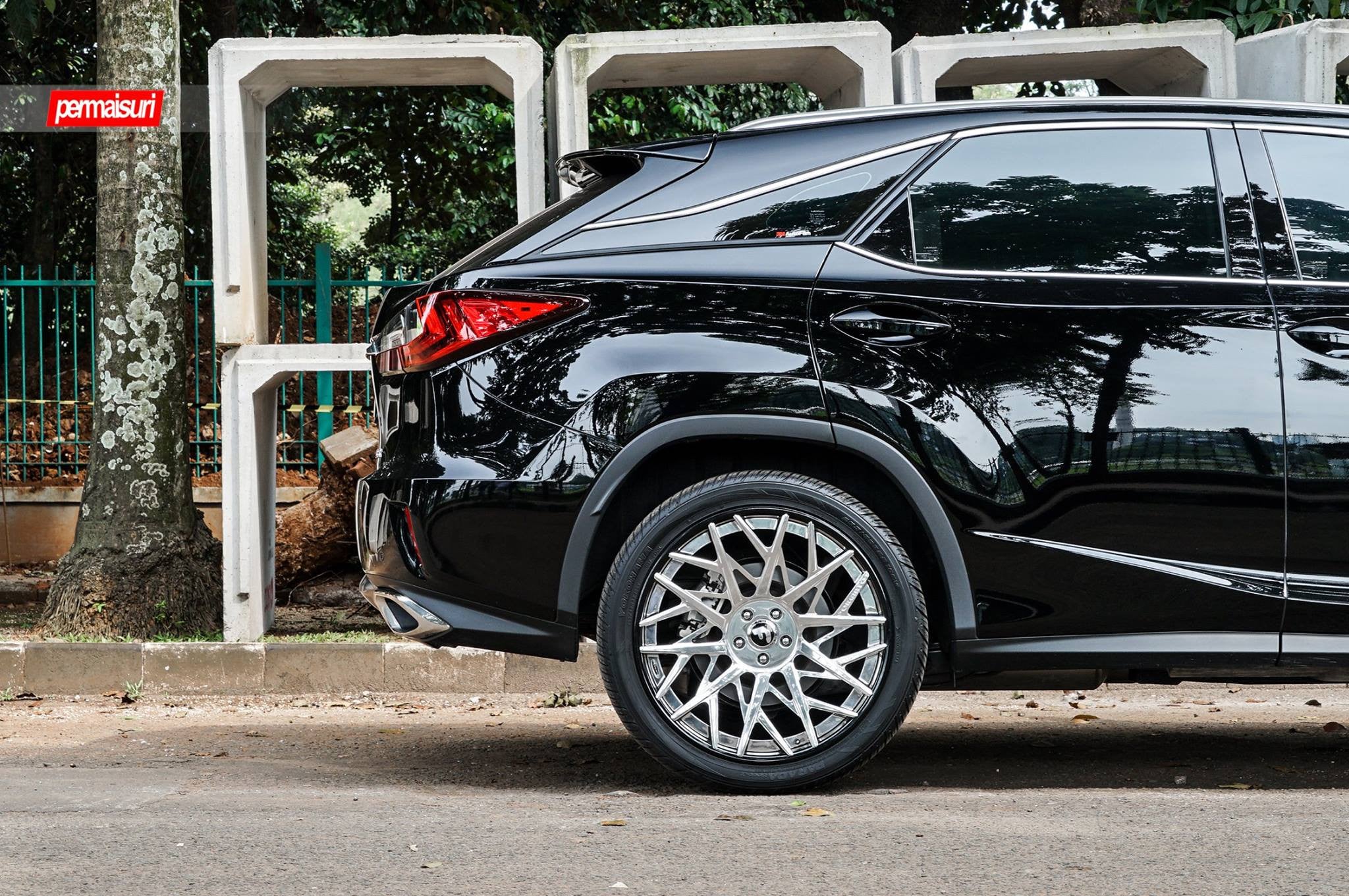 Black Lexus RX with Aftermarket Fender Flares - Photo by Forgiato