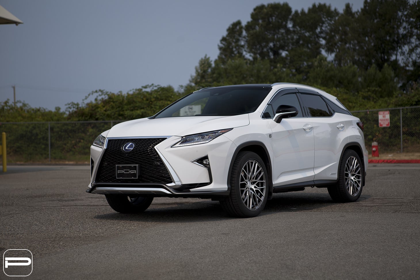 Front Bumper with Fog Lights on White Lexus RX - Photo by PUR Wheels