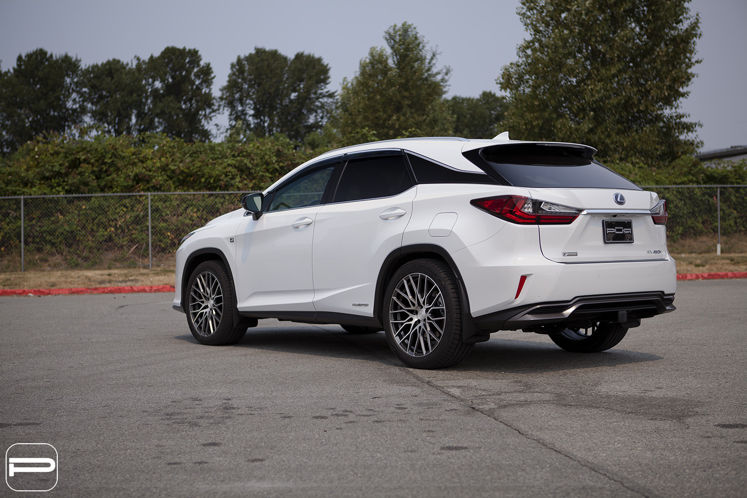 White Lexus RX with Large Roofline Spoiler - Photo by PUR Wheels