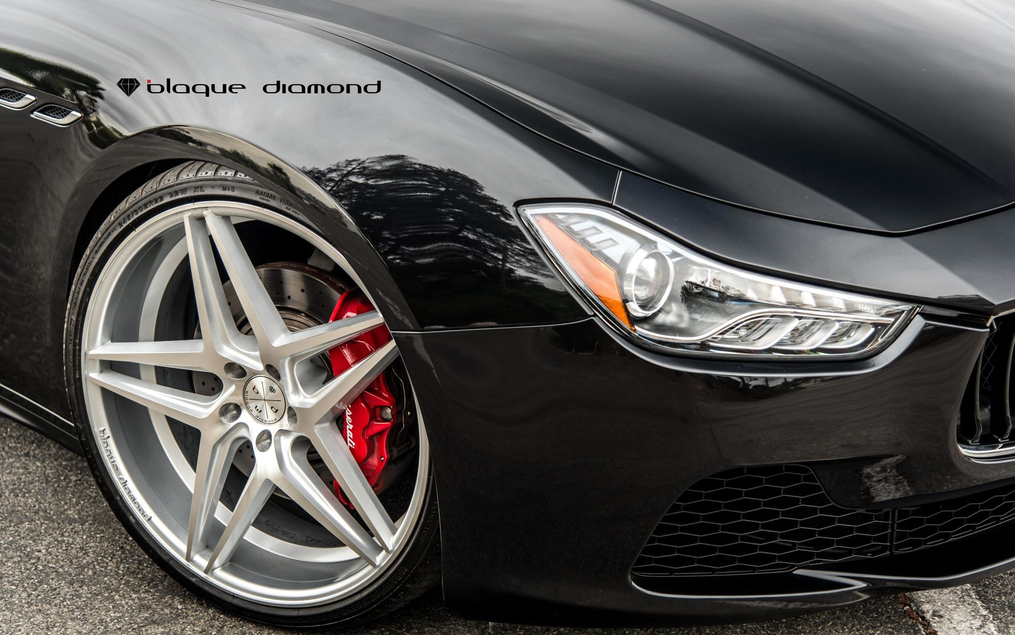 Custom Projector Headlights on Black Meserati Ghibli - Photo by Blaque Diamond