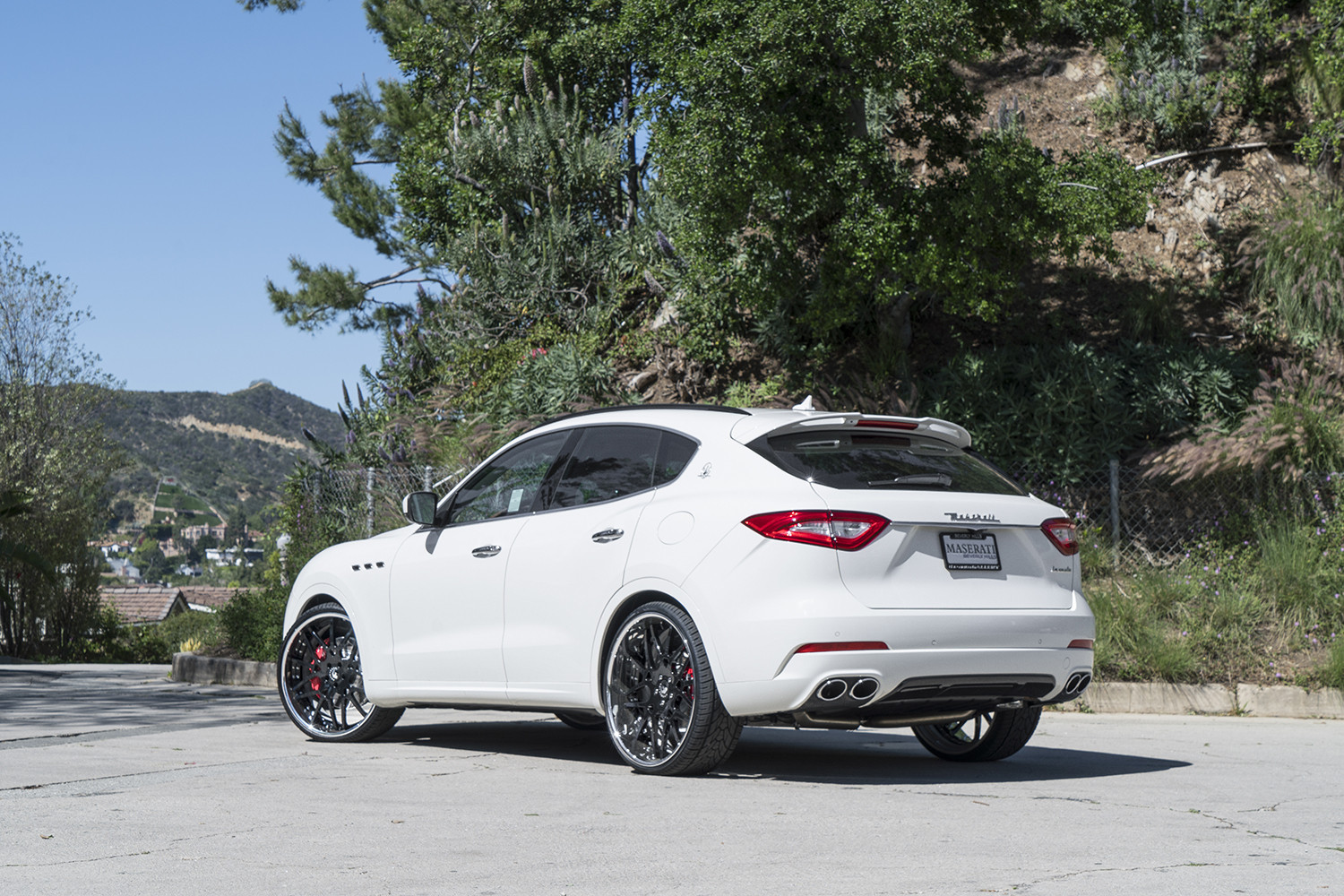 Gloss Black Forgiato Rims on White Maserati Levante - Photo by Forgiato