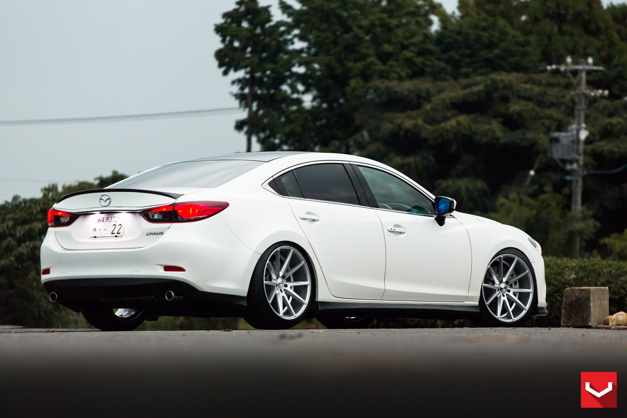 White Mazda 6 with Aftermarket Side Skirts - Photo by Vossen