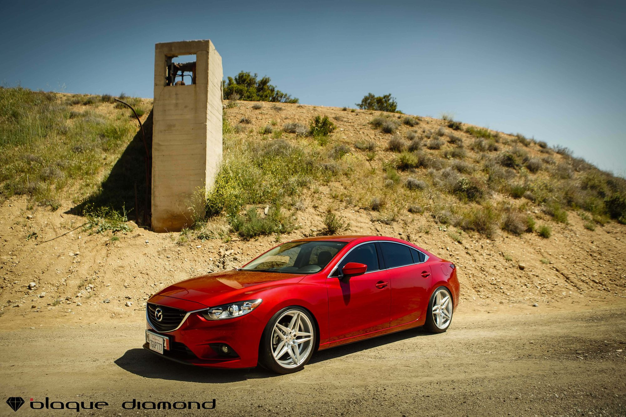 Front Bumper with Fog Lights on Red Mazda 6 - Photo by Blaque Diamond