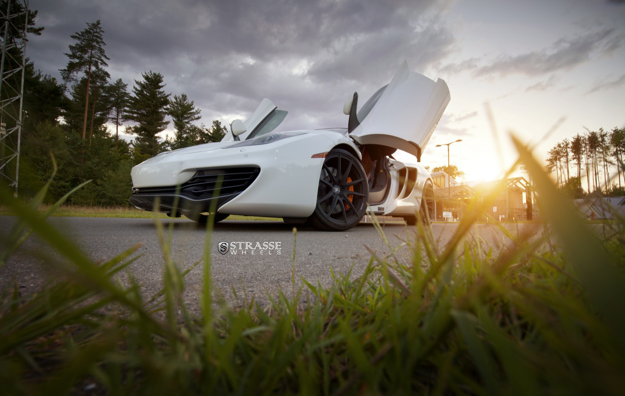 White Mclaren 12C with Custom Vertical Doors - Photo by Strasse Forged