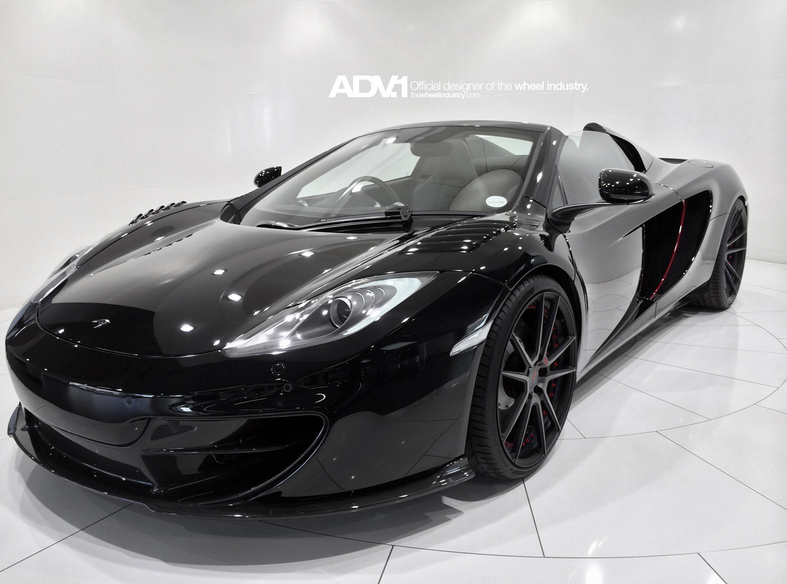 Black ADV1 Rims With Red Rivets on Mclaren 12c - Photo by ADV.1