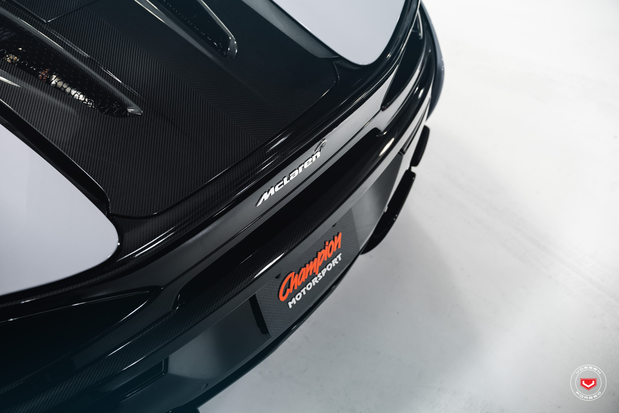 Carbon Fiber Rear Bumper on Gray McLaren 570S - Photo by Vossen