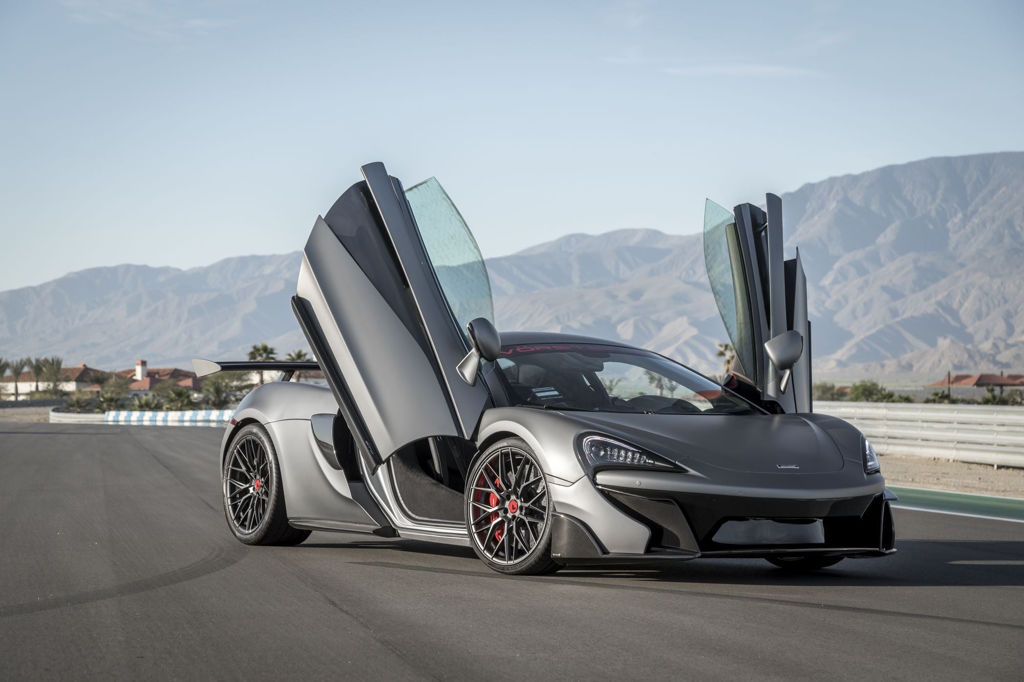 Gray McLaren 570S with Vertical Doors - Photo by Vorstiner