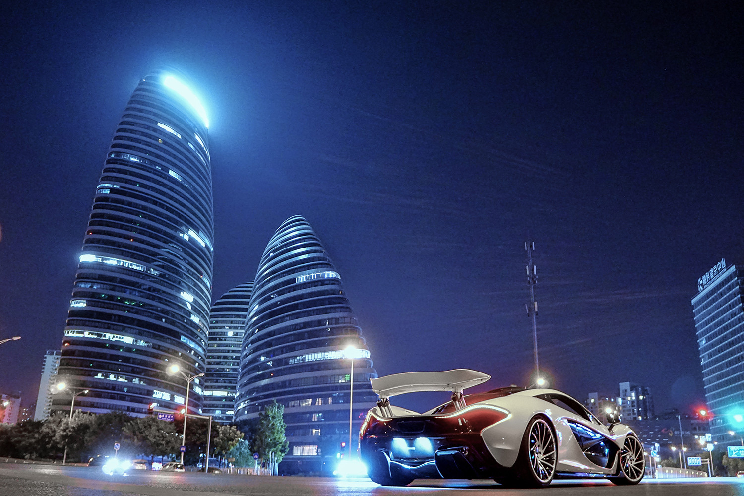 White McLaren P1 with Custom Large Wing Spoiler - Photo by Forgiato