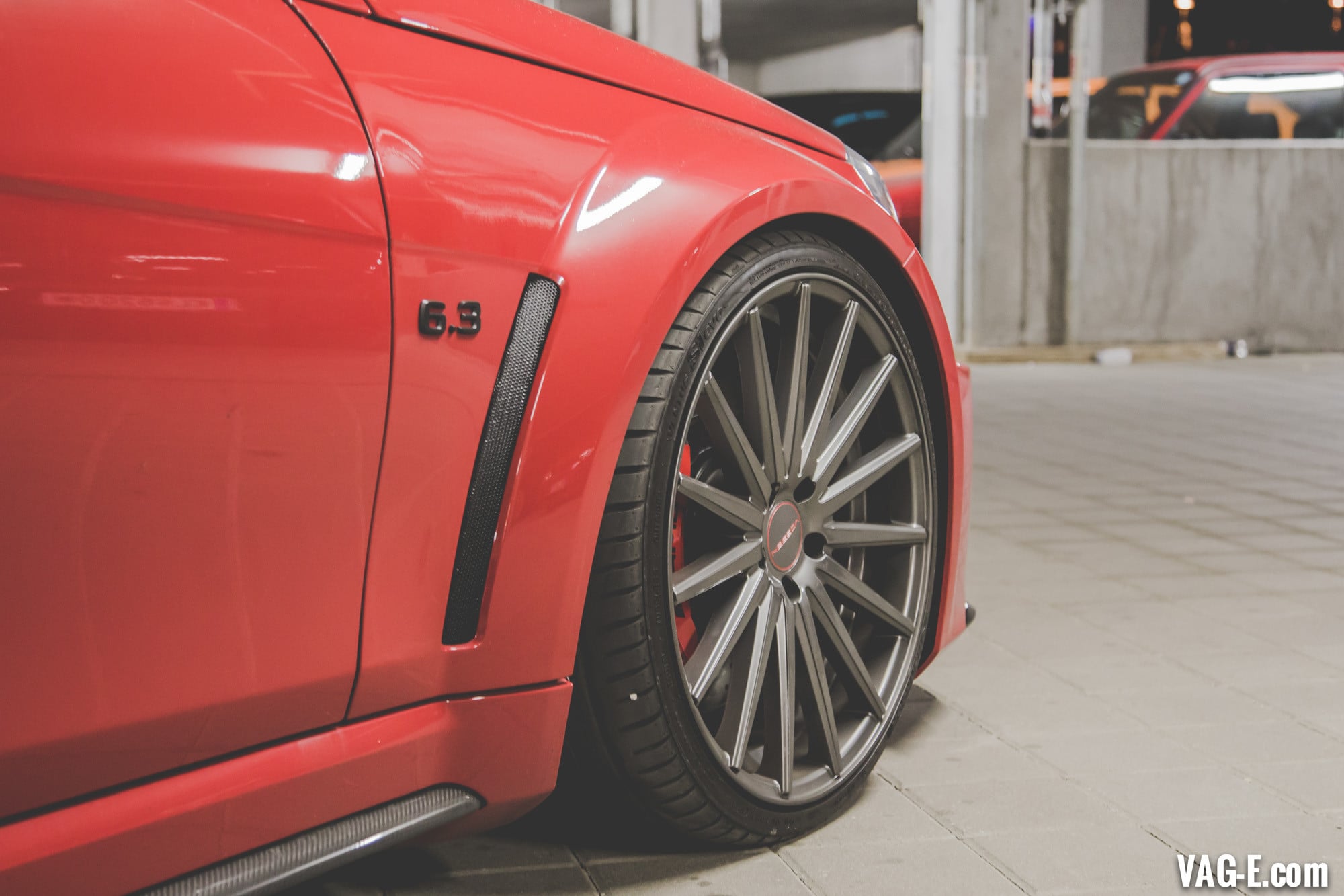 Carbon Fiber Side Skirts on Red Mercedes C Class - Photo by Vossen