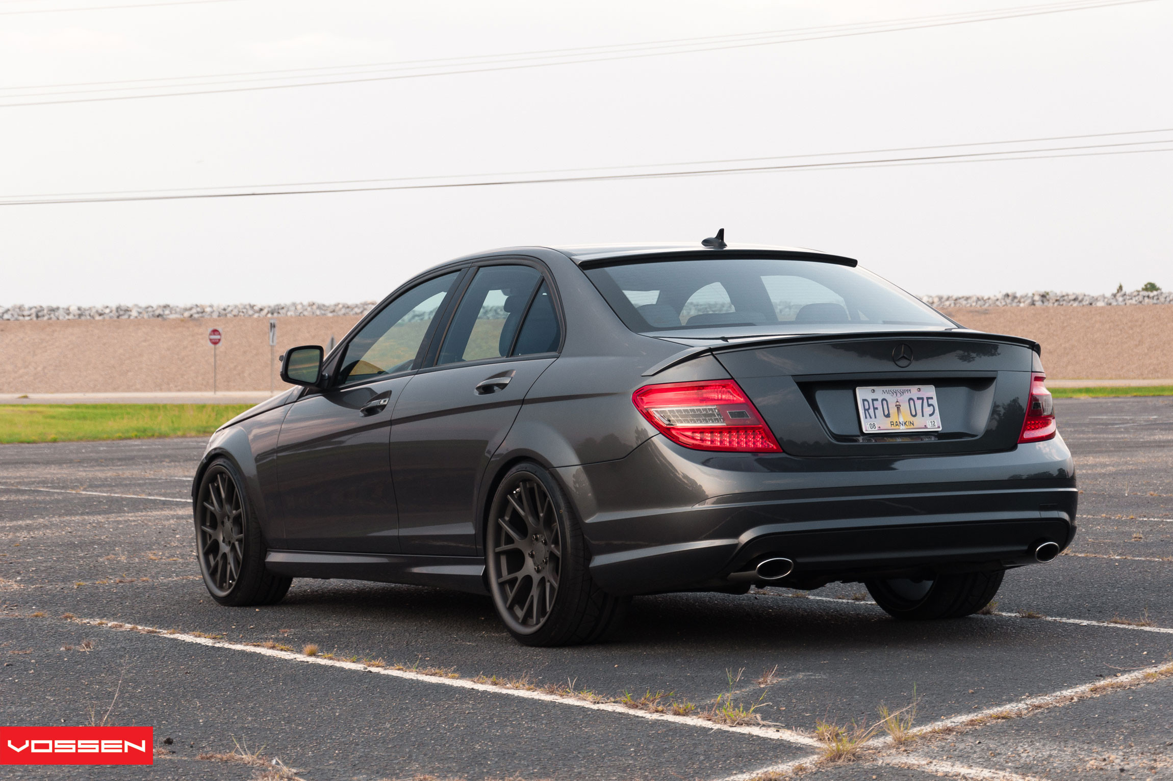 Red Clear LED Taillights on Black Mercedes C Class - Photo by Vossen