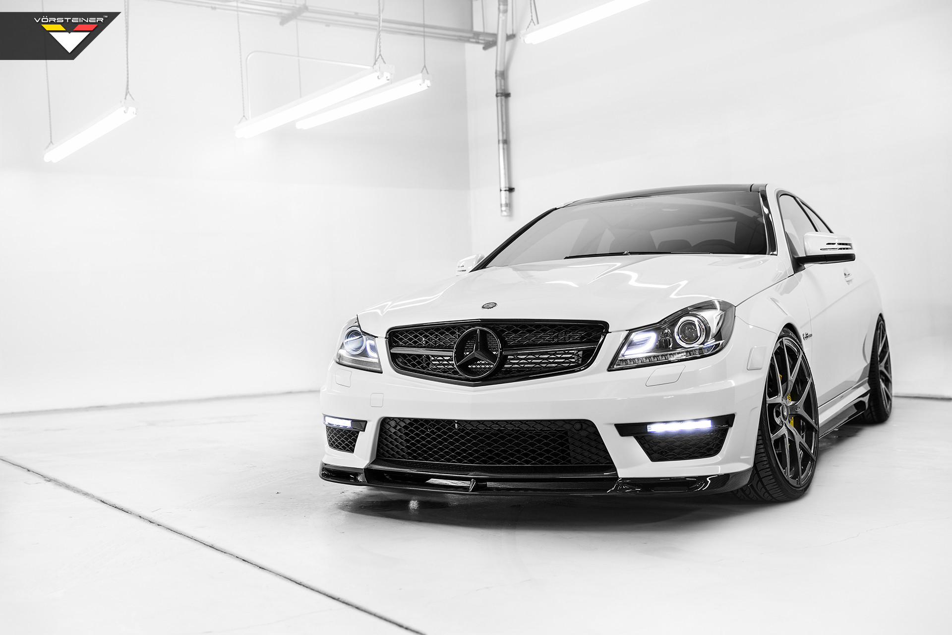 White Mercedes C Class with Carbon Fiber Front Lip - Photo by Vorstiner