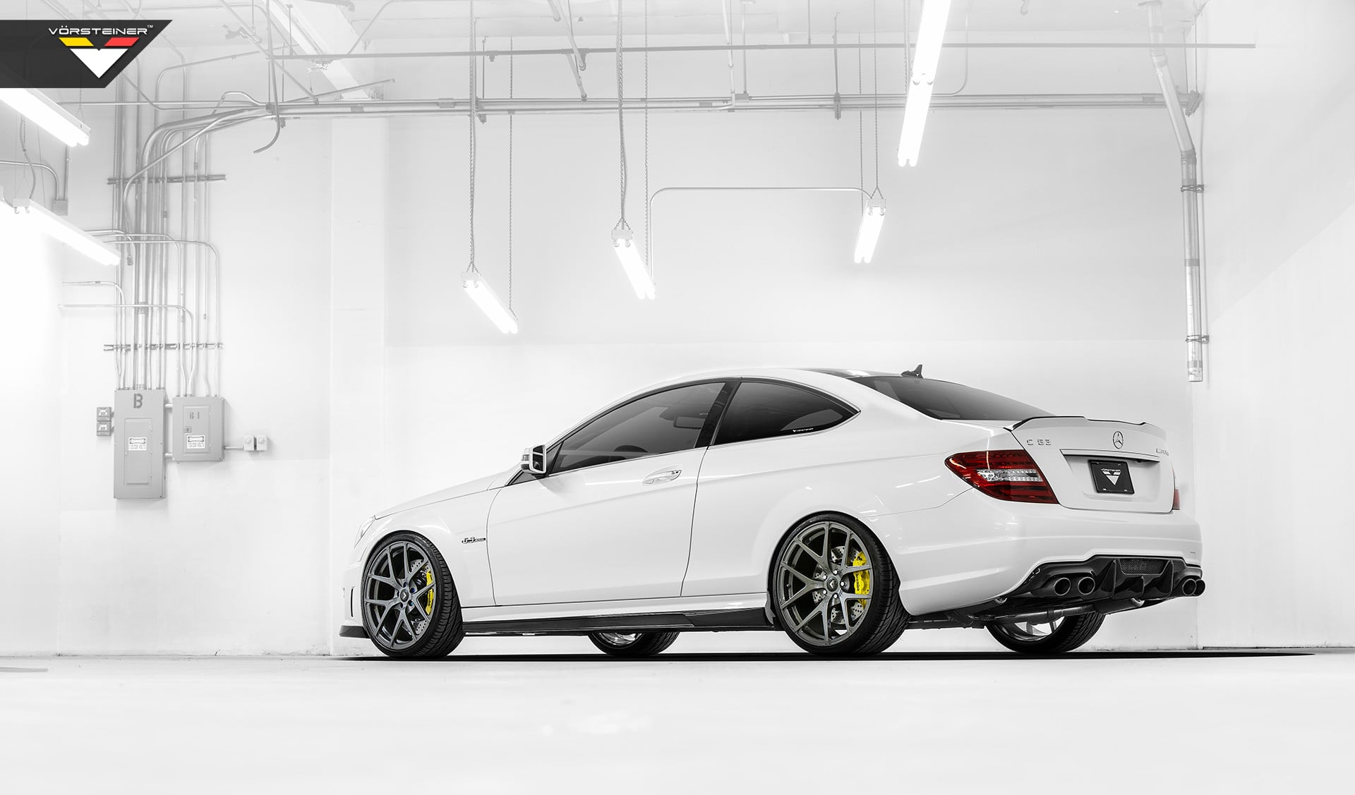 White Mercedes C Class with Carbon Graphite Vorsteiner Wheels - Photo by Vorstiner