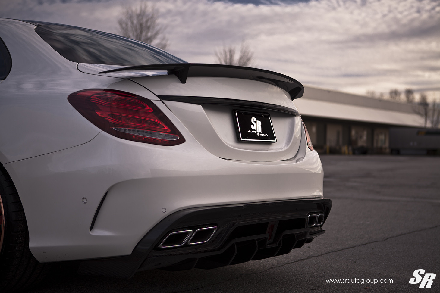 Red LED Taillights on White Mercedes C Class - Photo by SR Auto Group