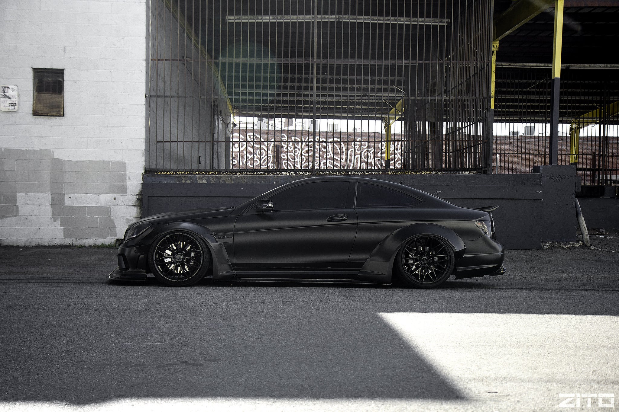 Black Matte Mercedes C Class with Aftermarket Body Kit - Photo by Zito Wheels