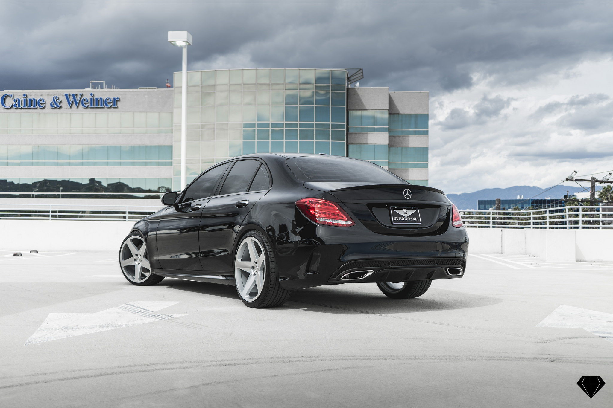 Black Mercedes C Class with Aftermarket Red LED Taillights - Photo by Blaque Diamond Wheels