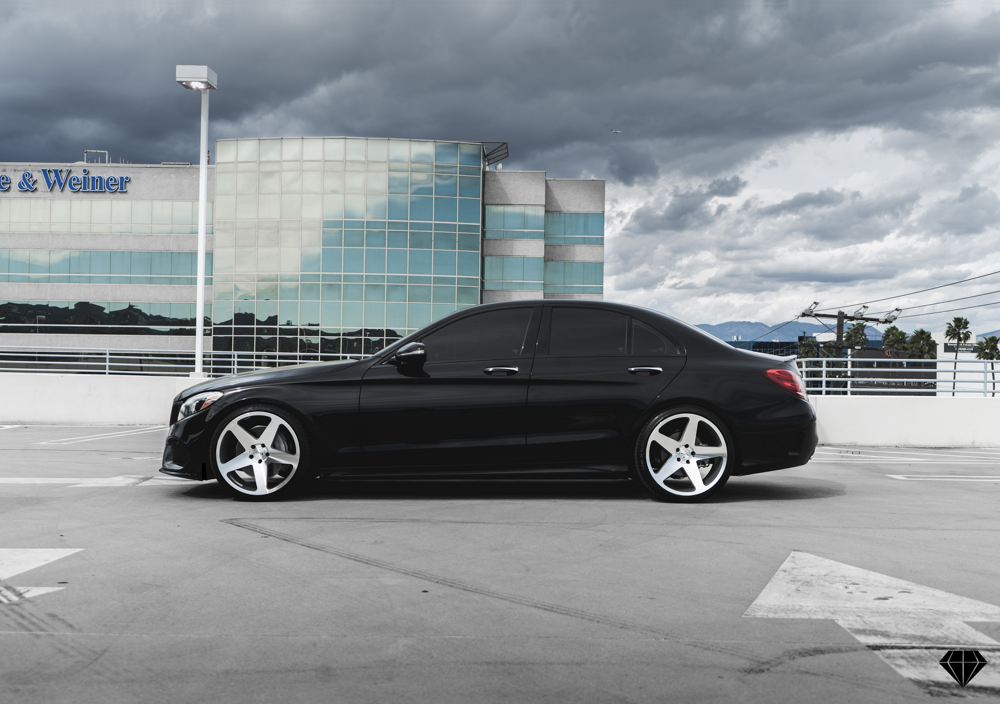 Silver Blaque Diamond Wheels on Black Mercedes C Class - Photo by Blaque Diamond Wheels