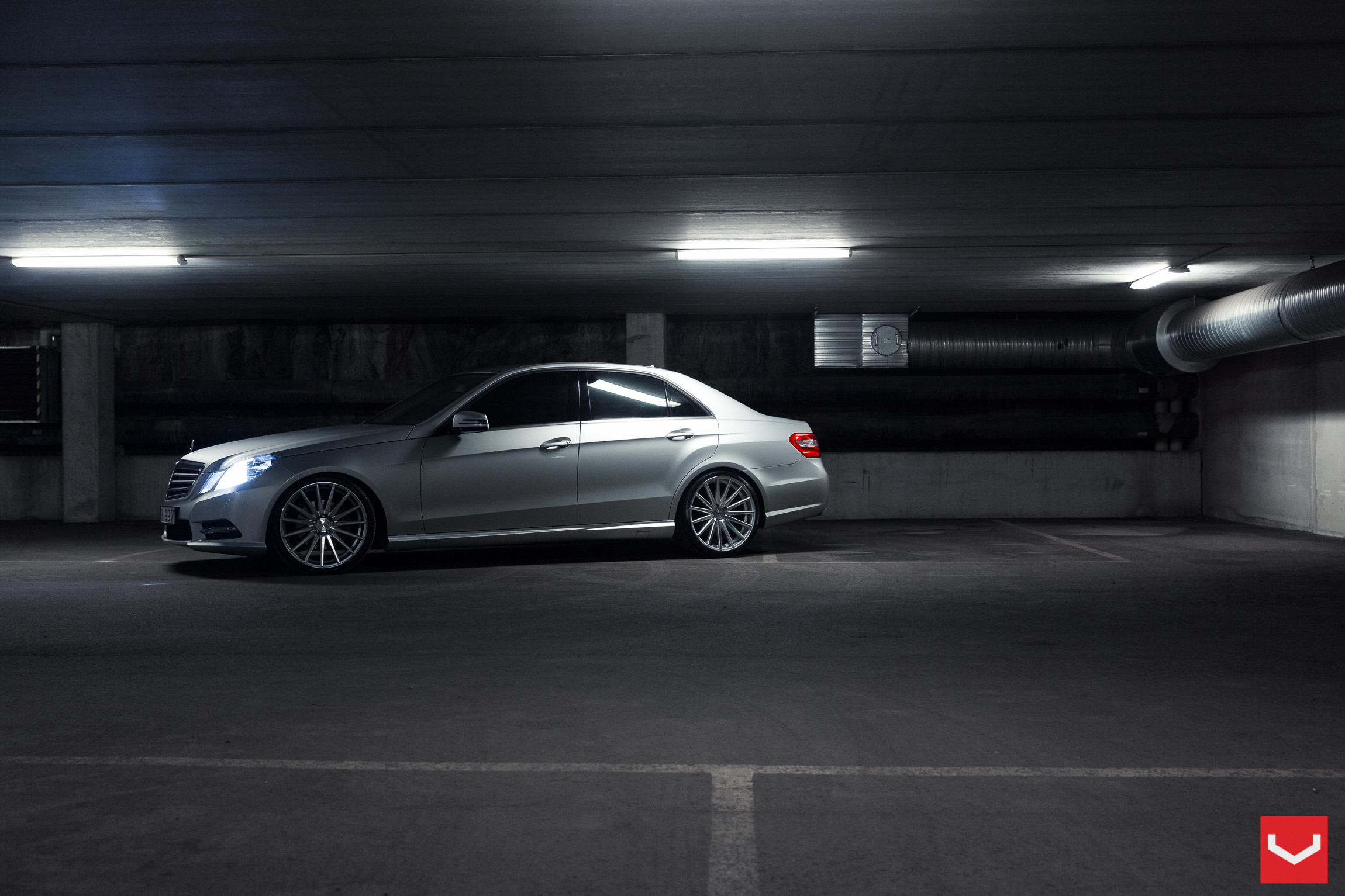 Silver Mercedes E Class with Aftermarket Side Skirts - Photo by Vossen