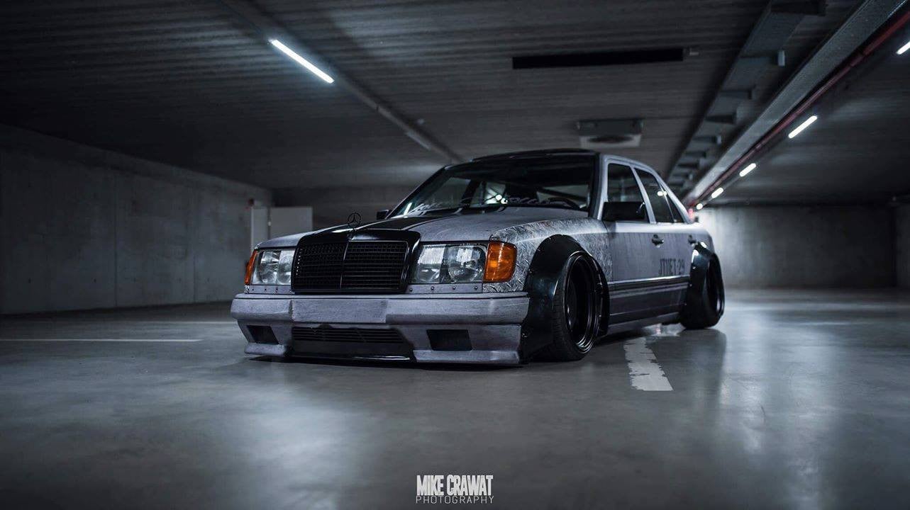 Blacked Out Mesh Grille on Gray Mercedes E Class - Photo by Clinched