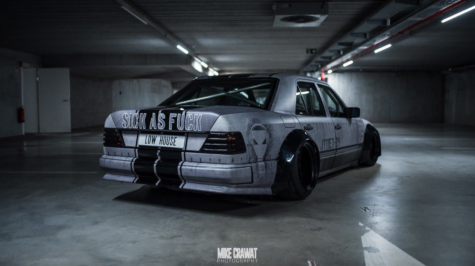 Custom Gray Mercedes E Class with Red Smoke Taillights - Photo by Clinched