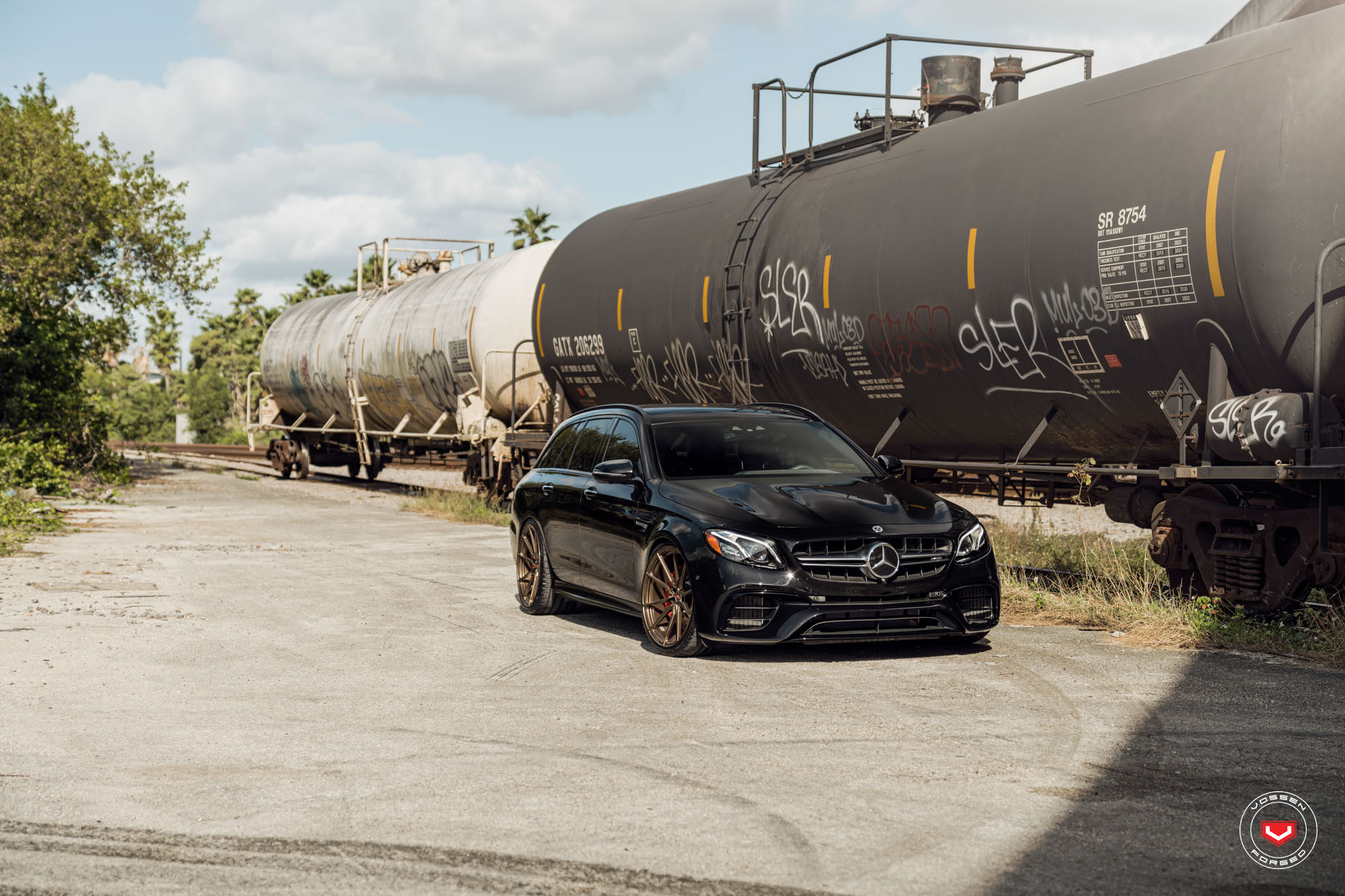 Aftermarket Front Bumper on Black Mercedes E Class - Photo by Vossen