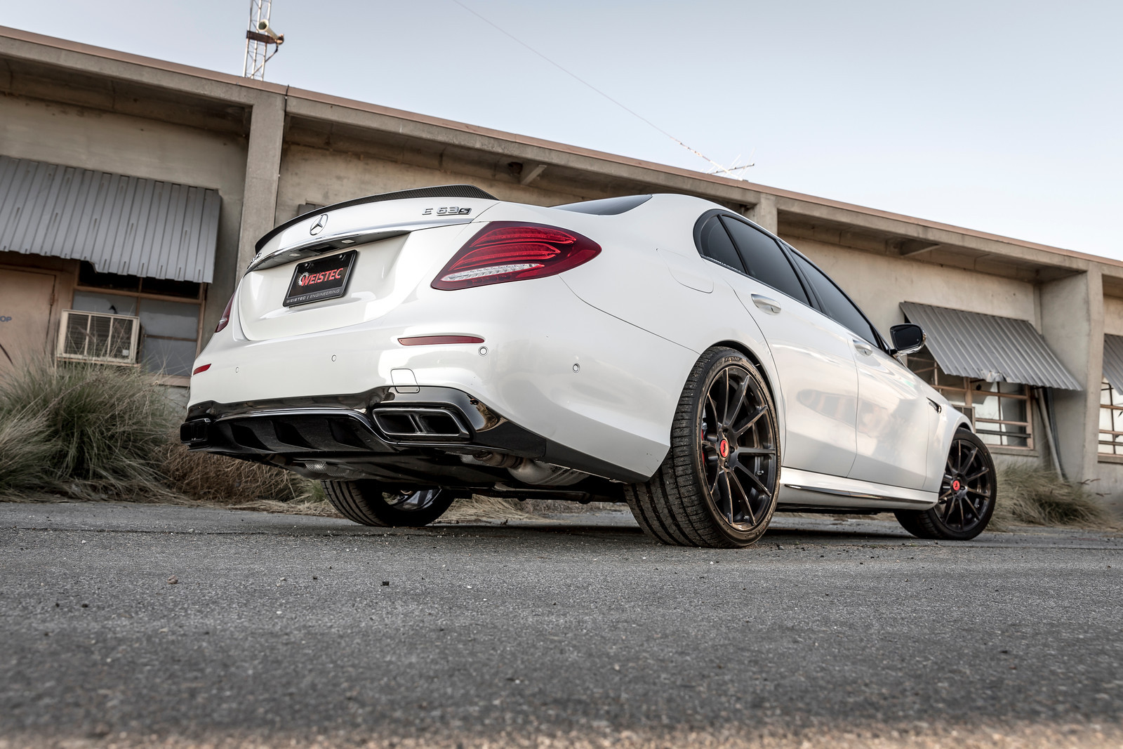Carbon Fiber Rear Lip Spoiler on White Mercedes E Class - Photo by Vorsteiner