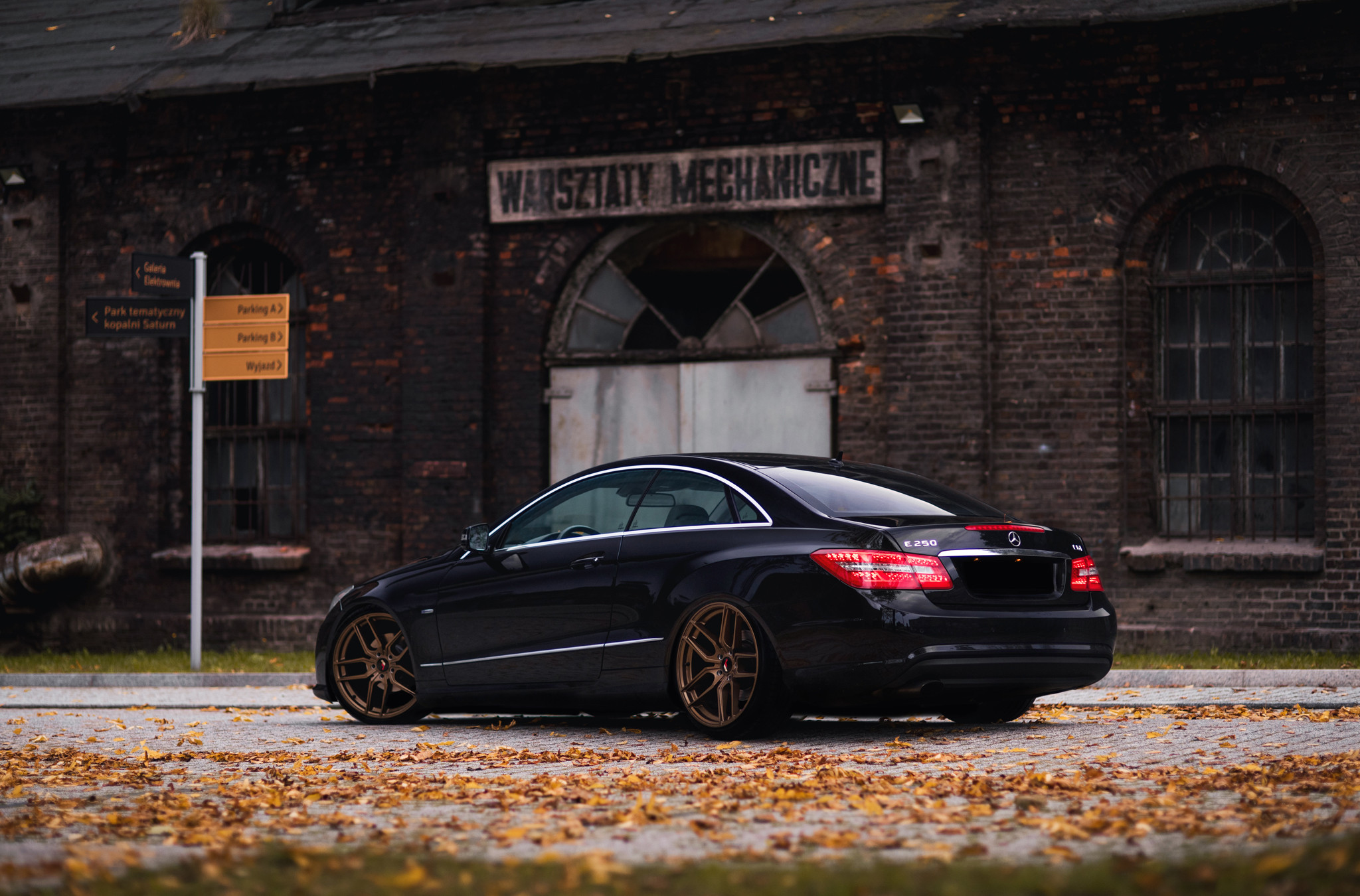 Red Clear LED Taillights on Black Mercedes E Class - Photo by JR Wheels