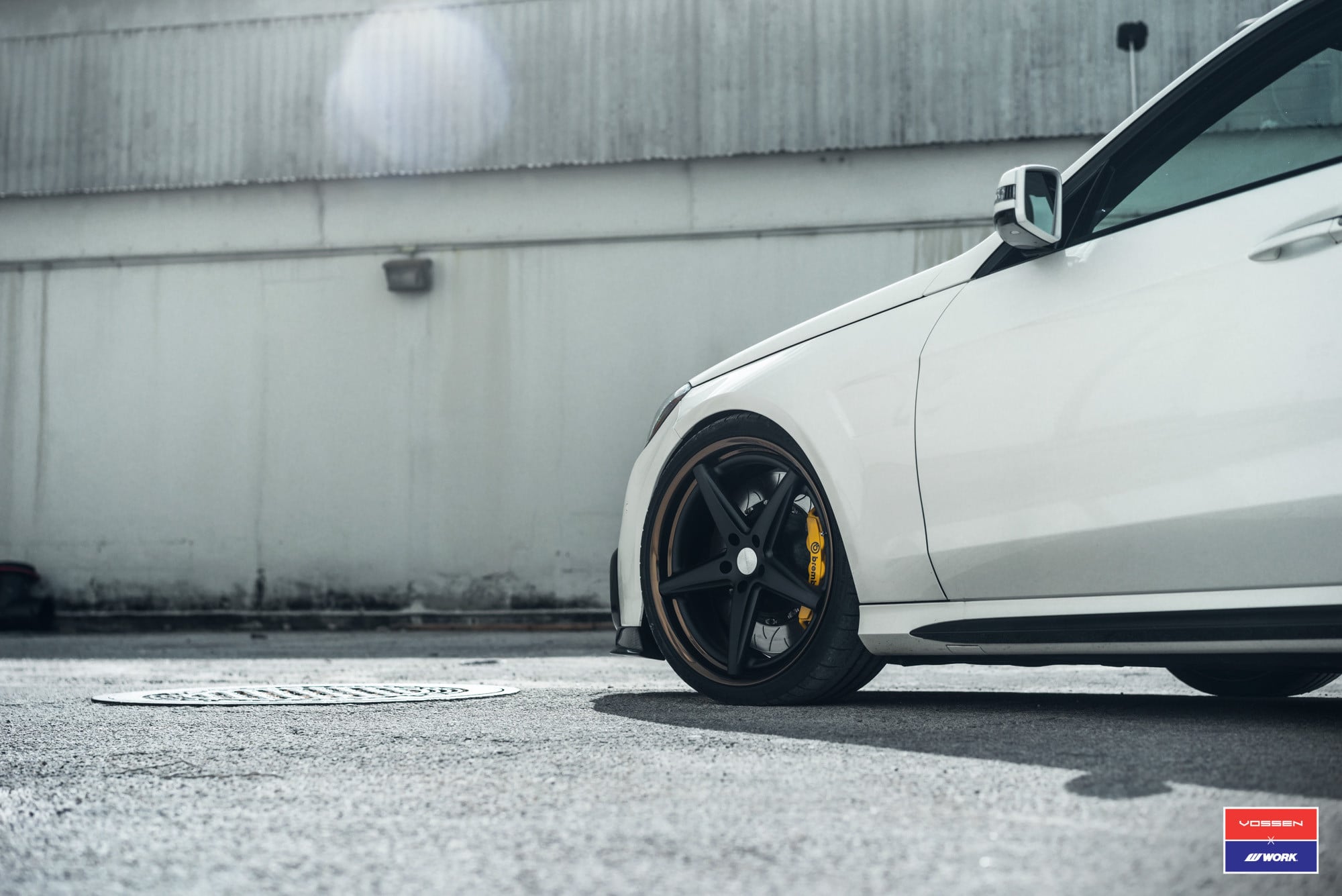 White Mercedes E Class with Black Bodyside Moldings - Photo by Vossen