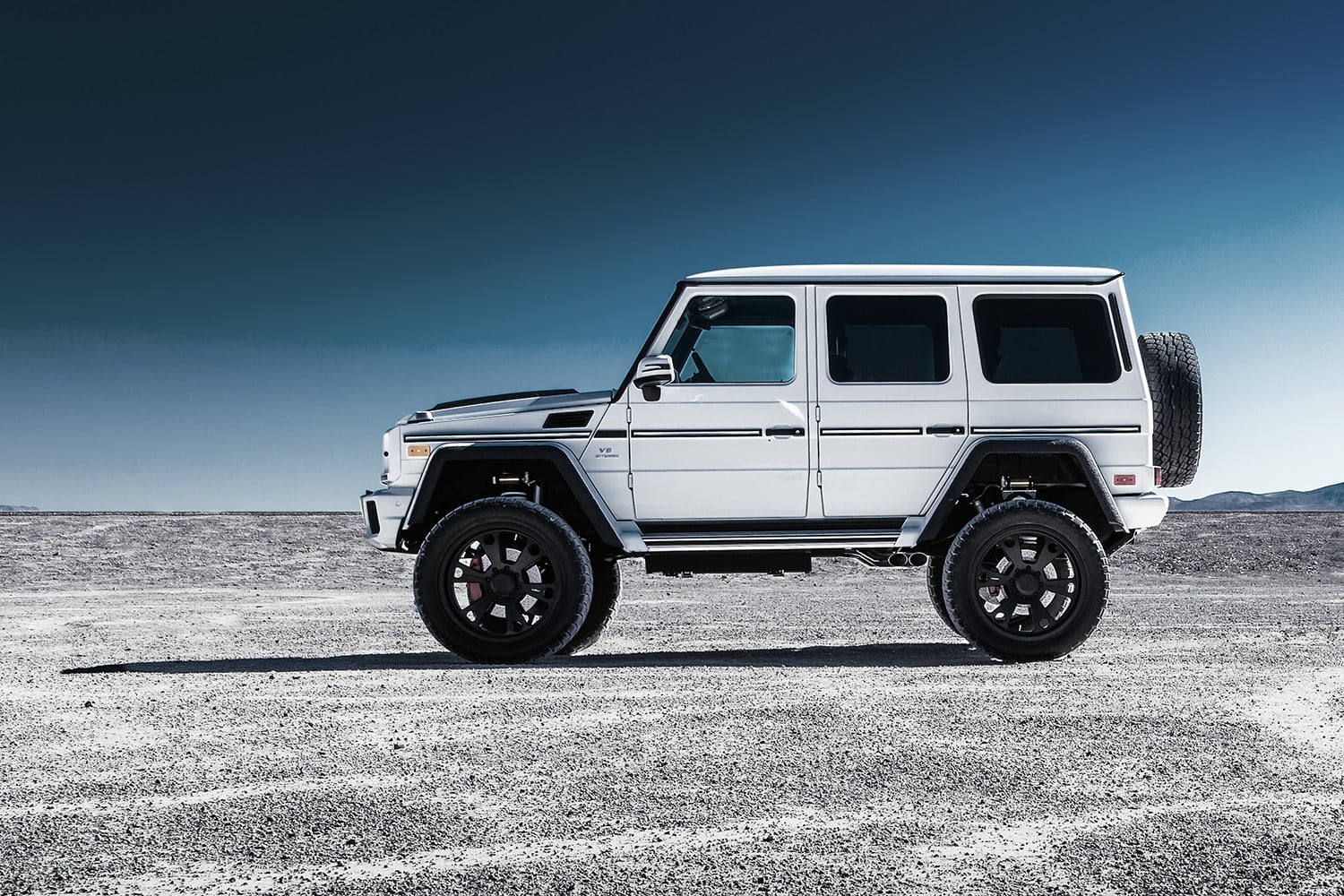 Custom Running Boards on White Mercedes G Class - Photo by Forgiato