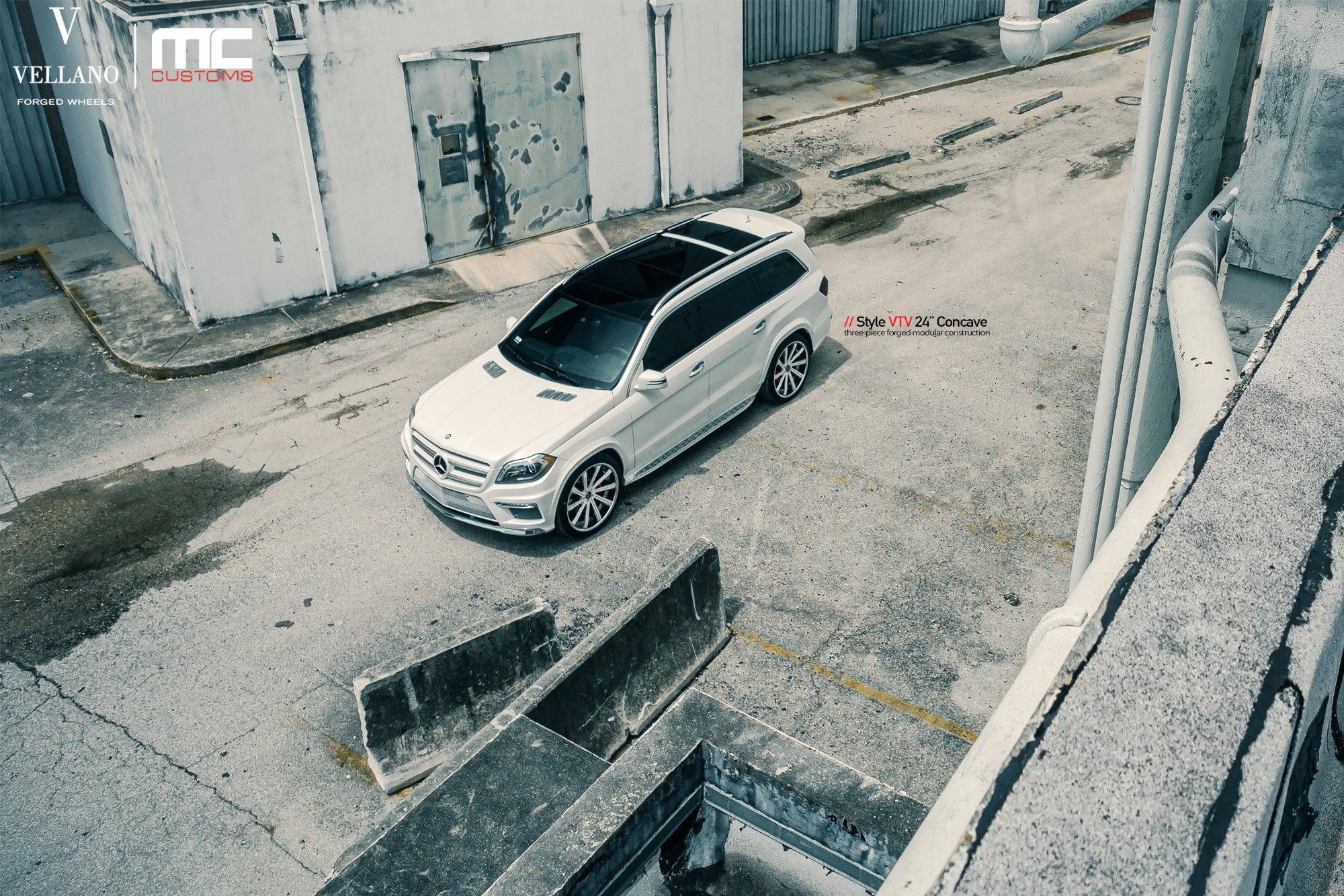 White Mercedes GL Class with Base Rack System - Photo by Vellano