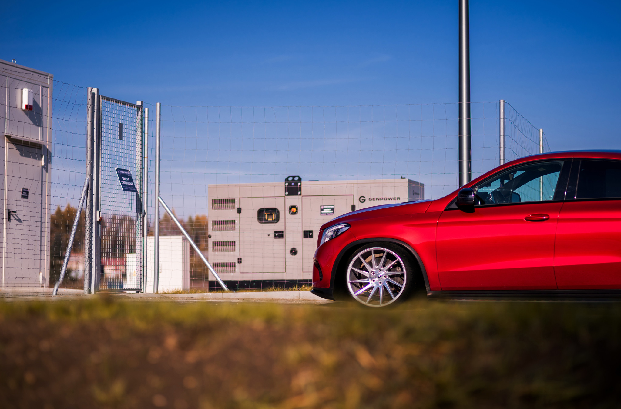 Aftermarket Side Skirts on Red Mercedes GLE - Photo by JR Wheels